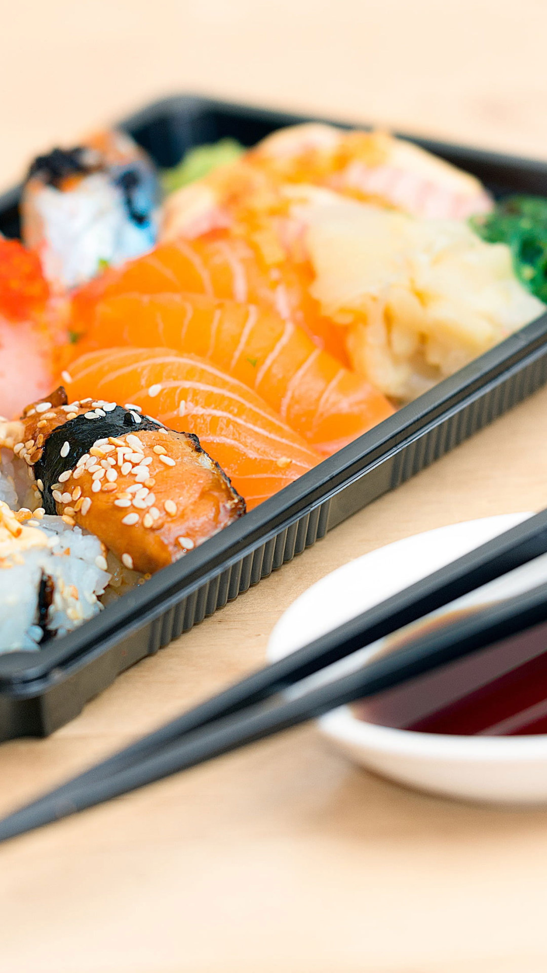 Sushi: Sashimi, sliced raw fish, eaten with chopsticks. 1080x1920 Full HD Wallpaper.