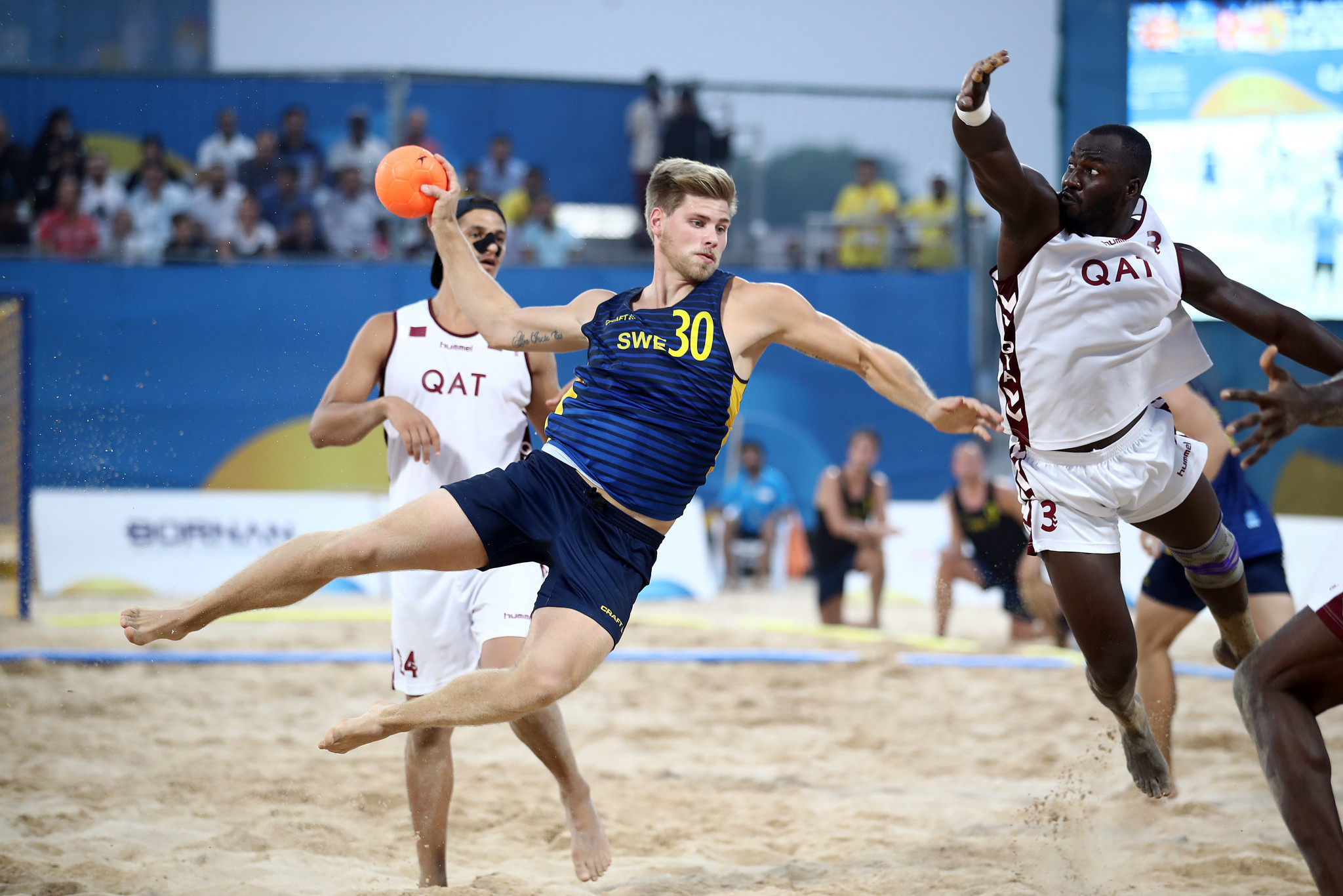 Beach Handball: Sweden vs. Qatar, An international competitive event organized by the IHF. 2050x1370 HD Background.