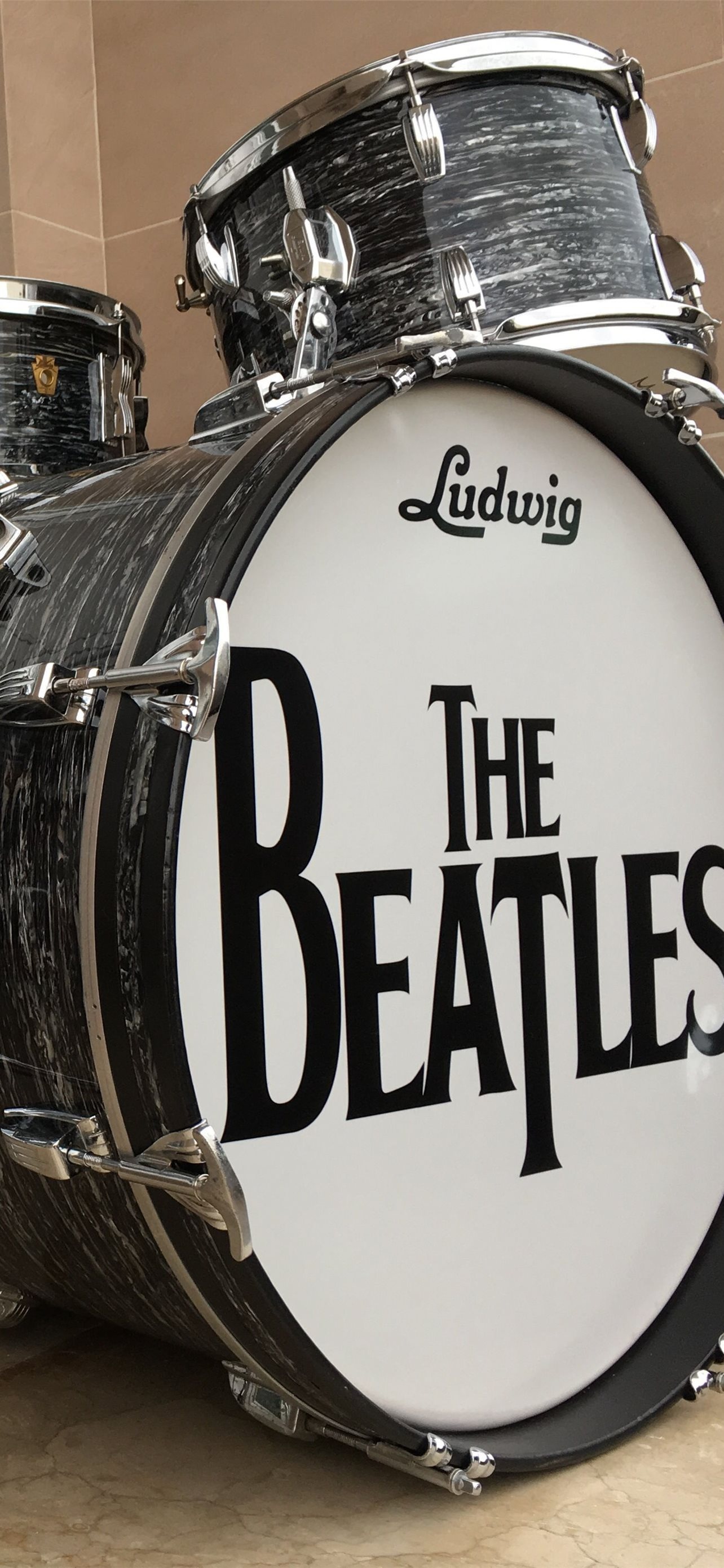 Bass Drum: Ludwig Drums, A United States percussion instrument manufacturer, The Beatles drummer Ringo Starr. 1290x2780 HD Background.