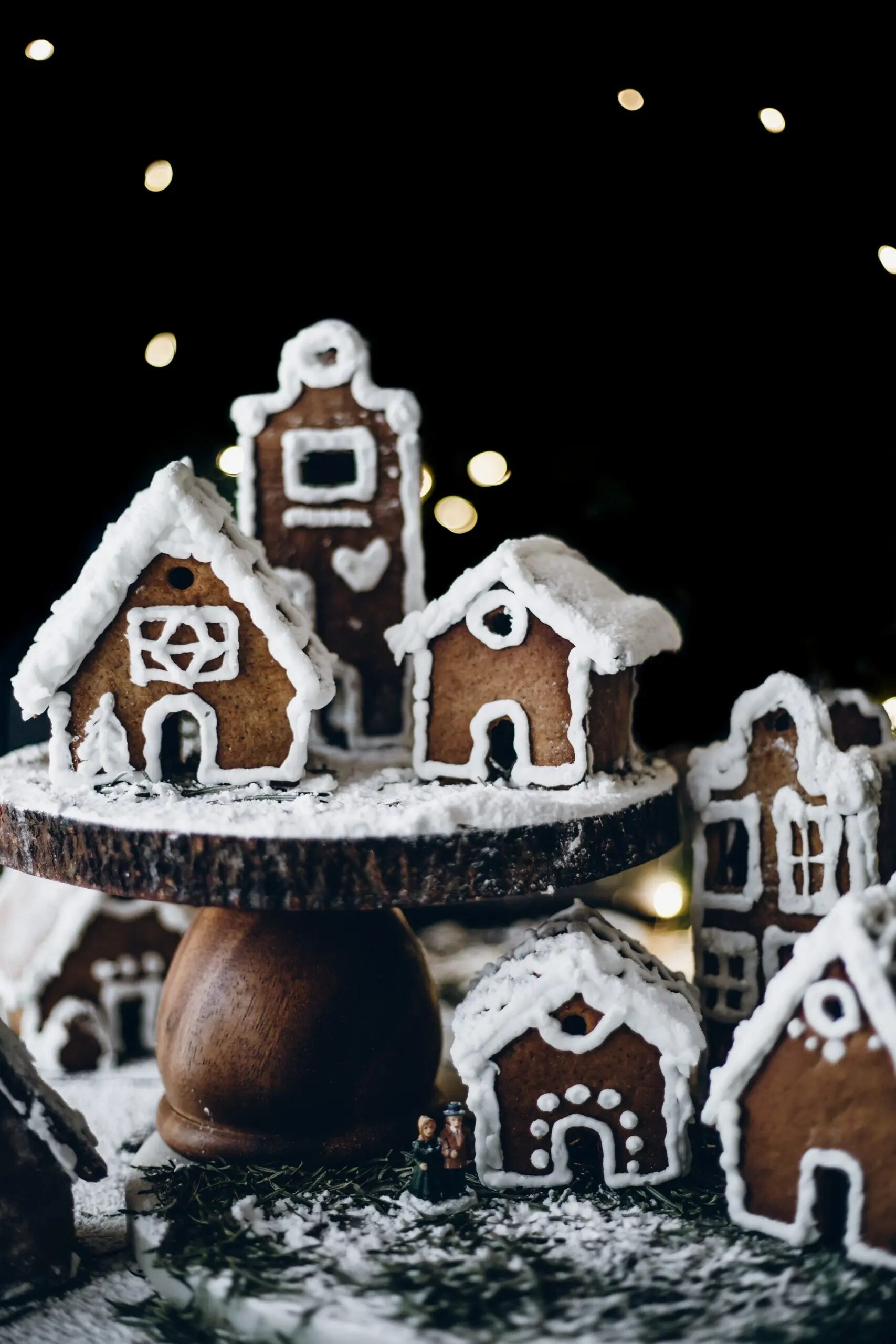 Gingerbread House: Christmas gingerbread village, Creations elaborately detailed, Icing decorations. 1710x2560 HD Background.