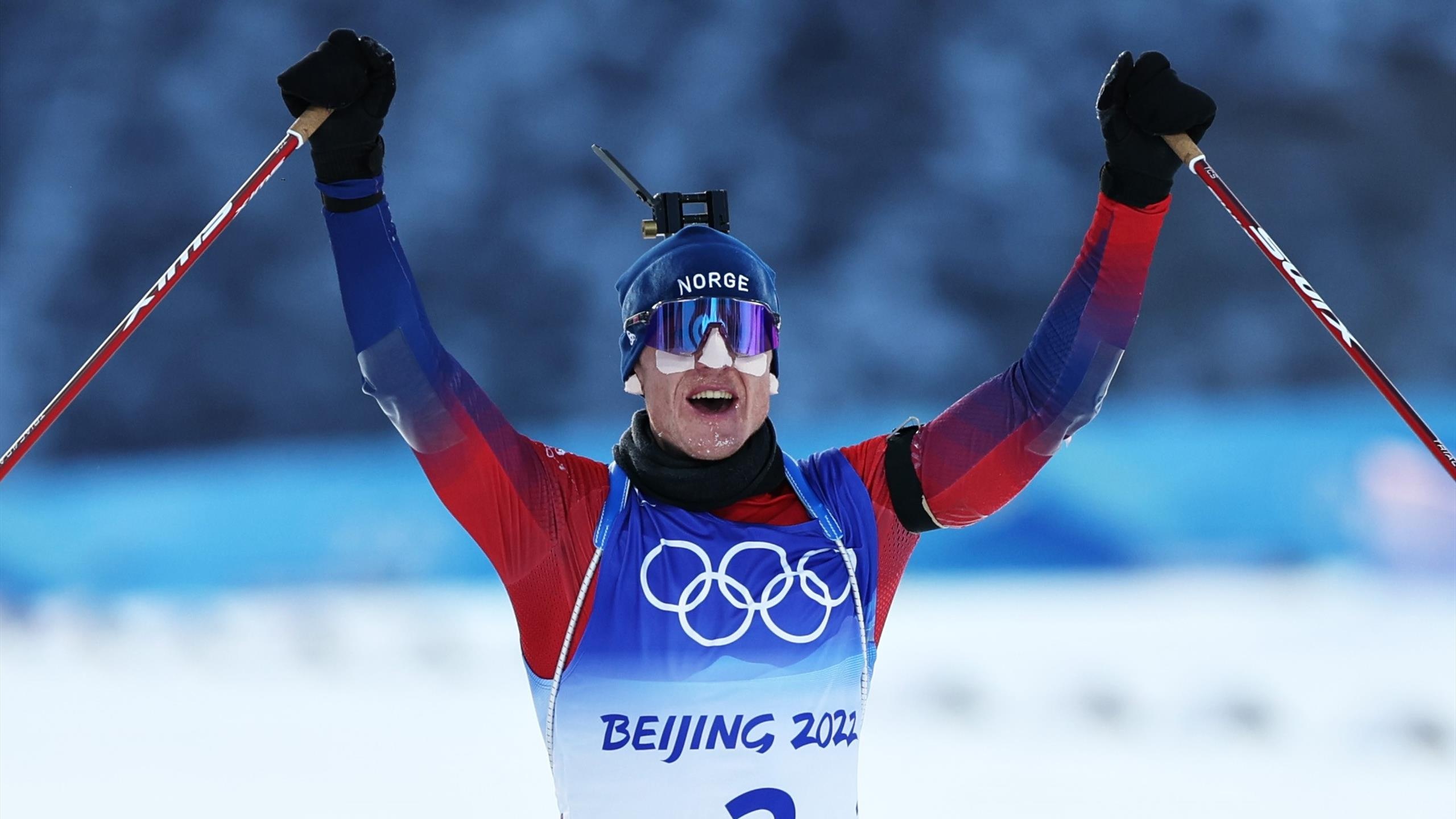 Biathlon: Olympic 2022, Johannes Thinges, A Norwegian biathlete, Gold, A mass start, Winter games. 2560x1440 HD Wallpaper.