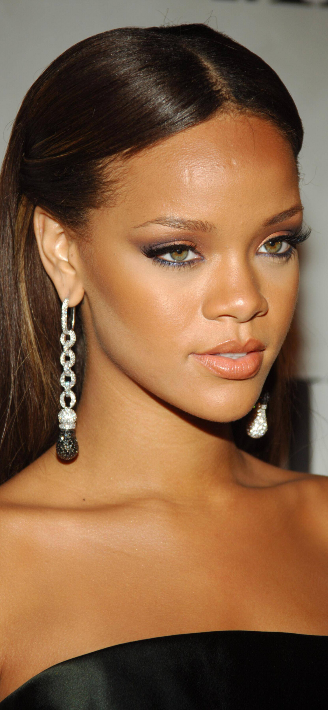 Rihanna: An eight-time Grammy Award winner, 14 billboard music awards. 1130x2440 HD Background.