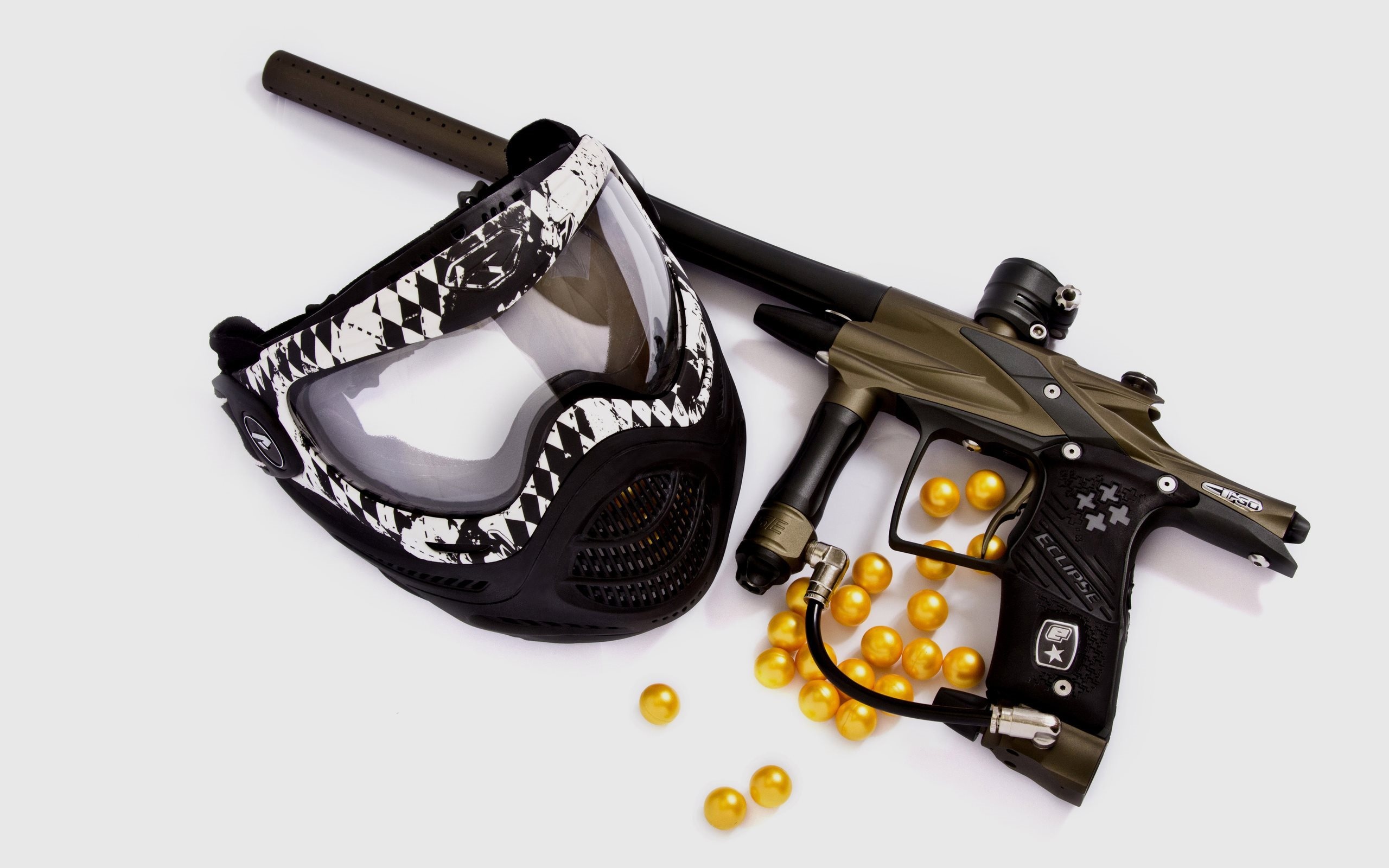 Paintball: A paint marker, shield mask and paints - equipment for an outdoor recreational game. 2560x1600 HD Wallpaper.