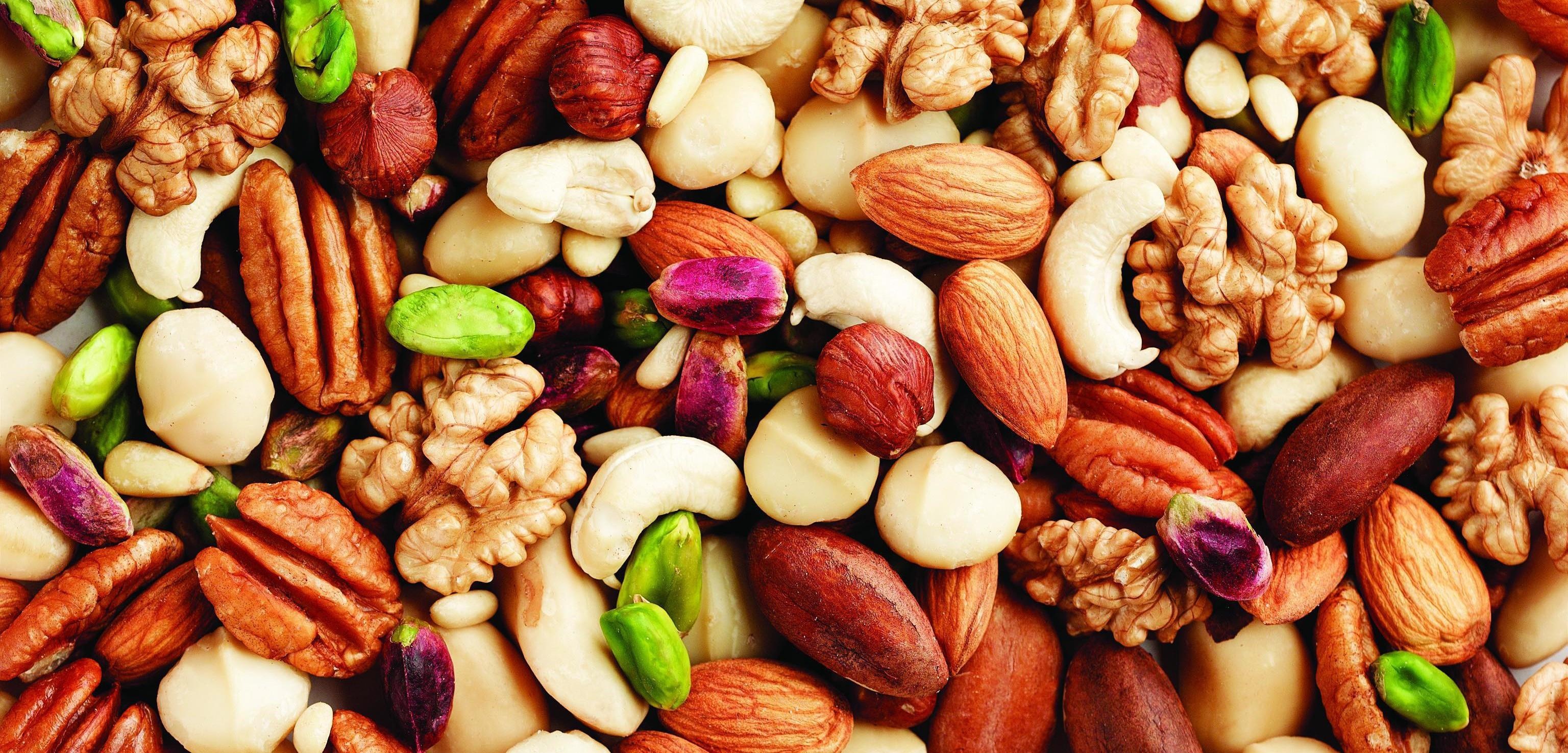 Nuts: The seeds of drupe fruits, Edible seed with a hard, inedible outer shell. 3080x1480 Dual Screen Background.