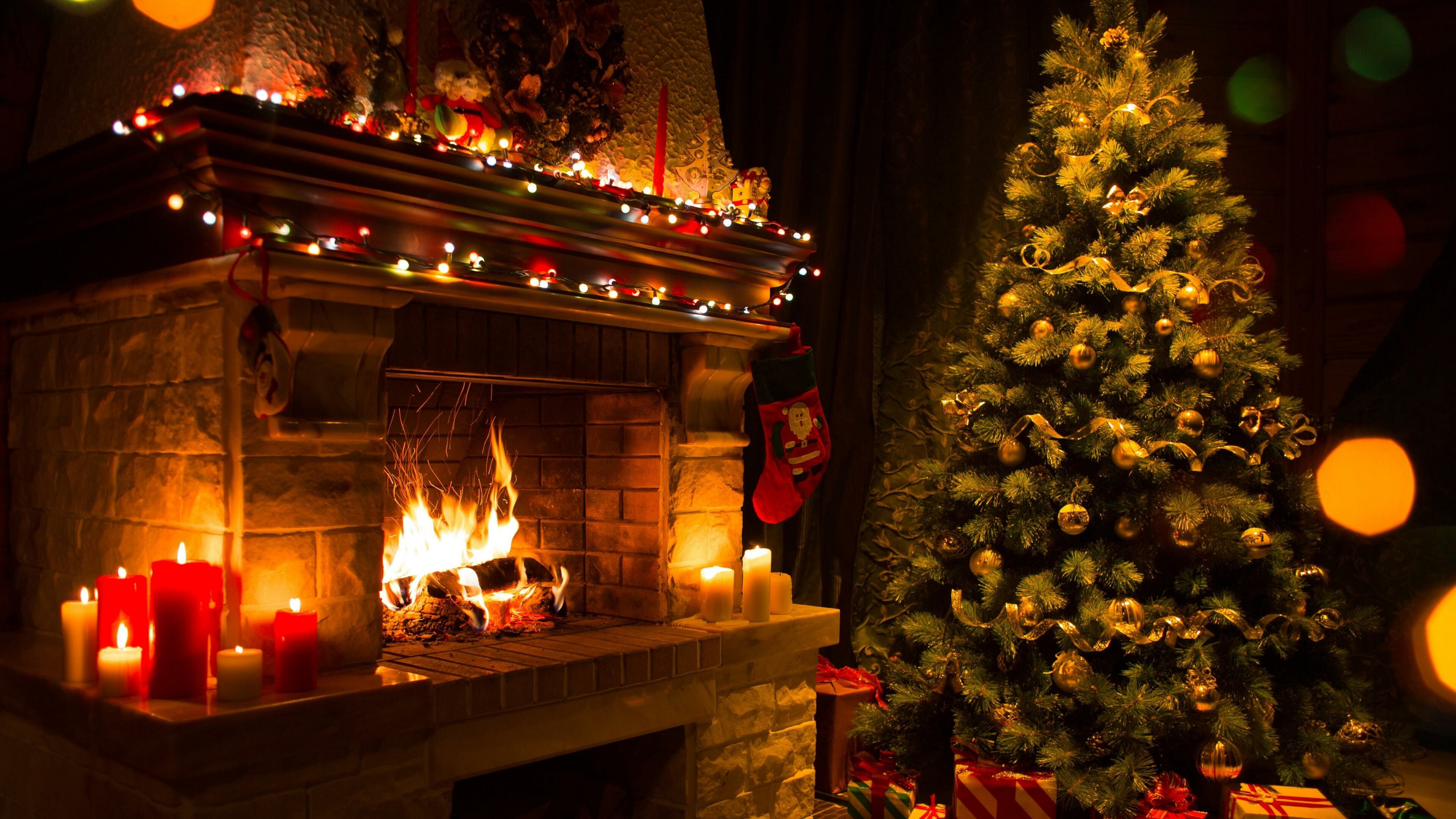 Christmas Fireplace: Light, Wood, Holiday ornament, Evergreen. 3840x2160 4K Wallpaper.