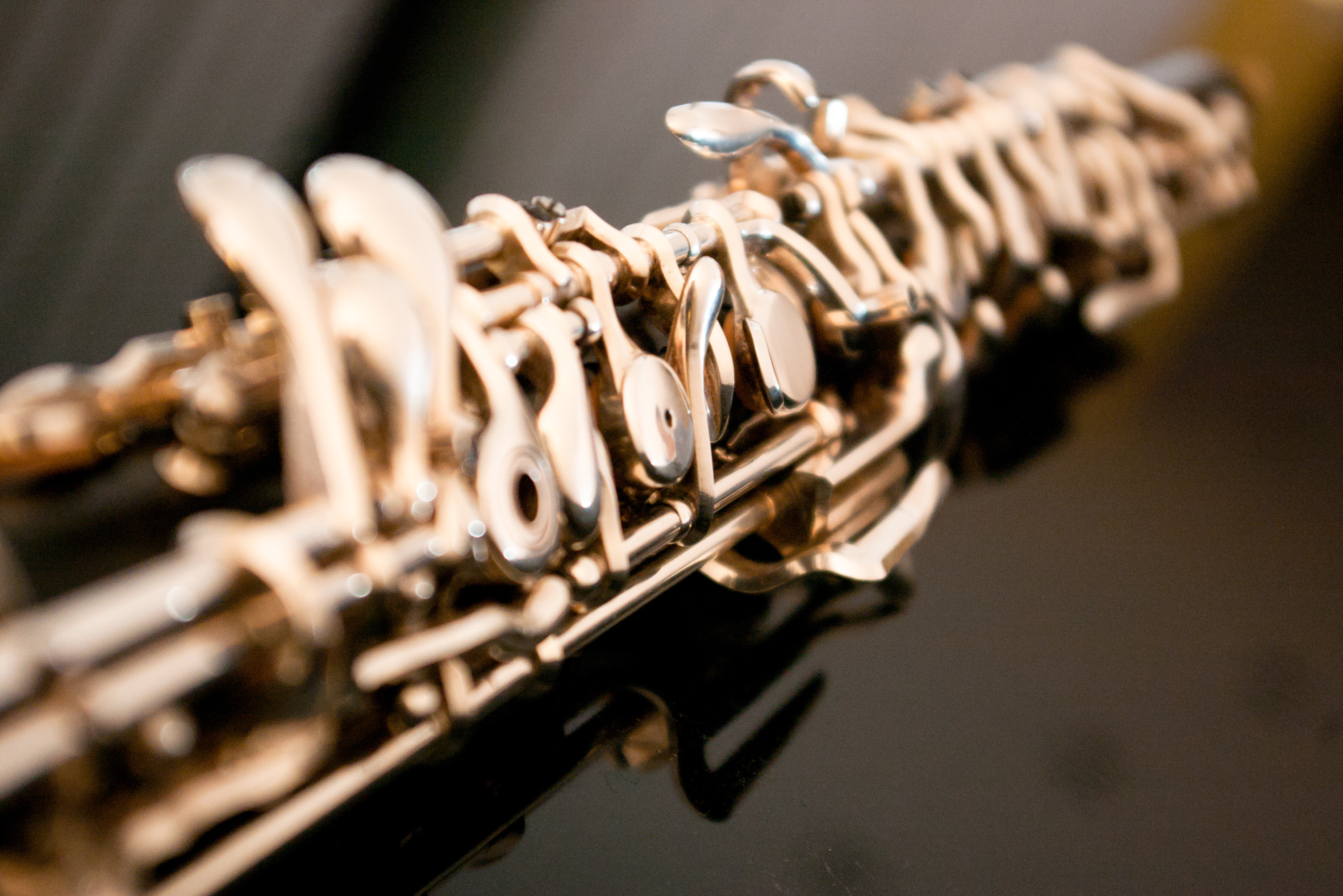 Oboe: A type of double reed woodwind instrument, A soprano register wind musical instrument. 3010x2010 HD Background.