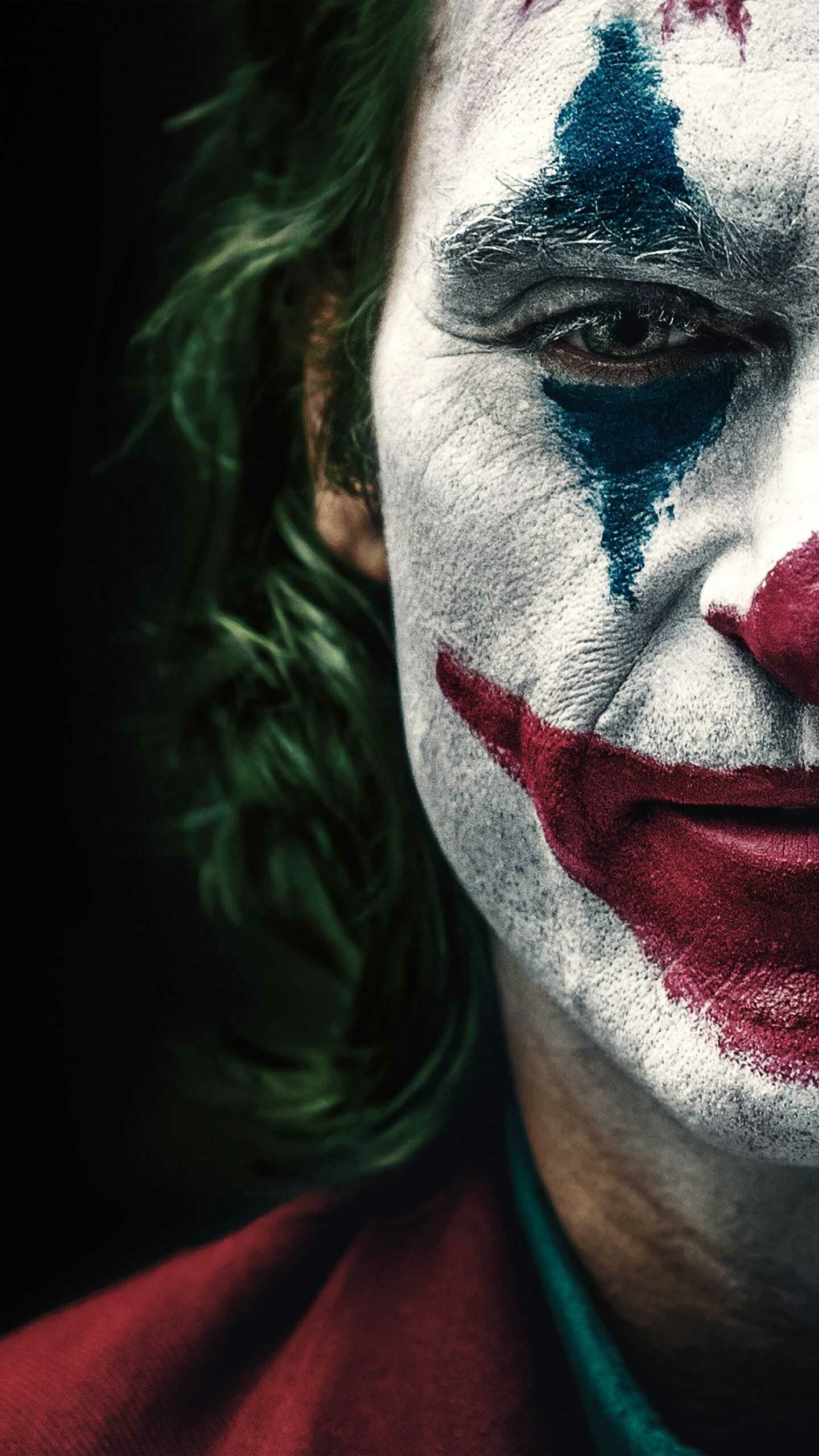 Joker, Provocative portrayal, Unflinching storytelling, Intense character study, 1440x2560 HD Phone