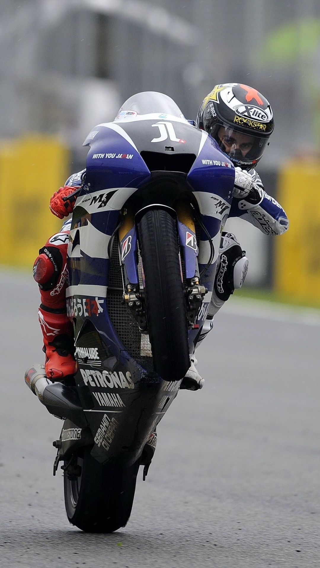 Motorcycle Racing: Wheelie, Remarkable Driving Skill, Extreme Sports, Yamaha Sportsbike. 1080x1920 Full HD Background.