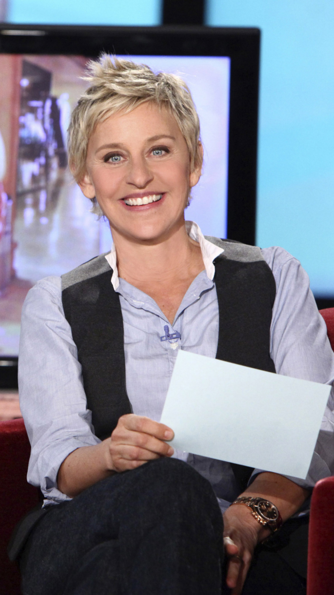 Ellen DeGeneres: A renowned name in the world of television especially in the category of stand-up comedians. 1080x1920 Full HD Background.