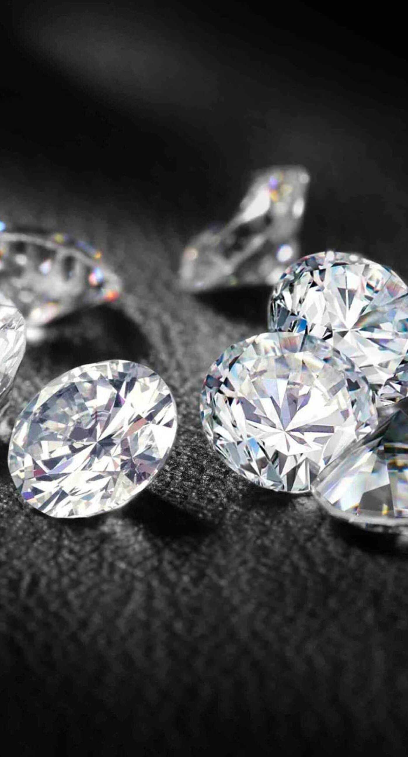 Gemstone: White diamond, Rarity and notoriety are characteristics that lend value to jewels. 1400x2600 HD Background.