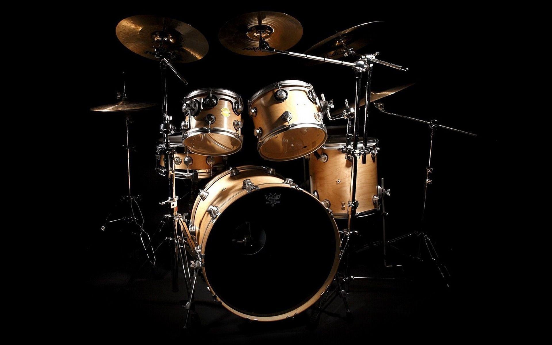 Musical Instruments: A mix of drums, A bass drum, A snare drum, Toms, Hi-hat, Cymbals mounted on stands. 1920x1200 HD Background.