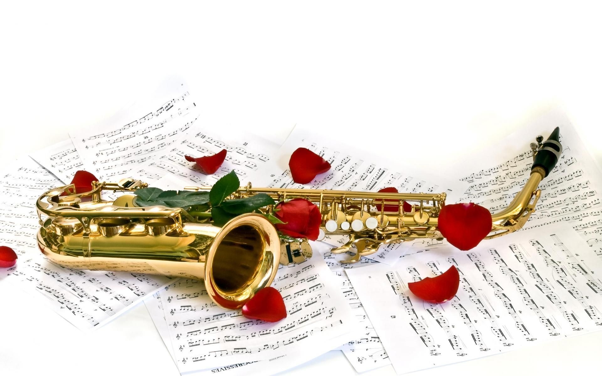 Saxophone: A musical instrument played by blowing into a mouthpiece and pressing keys with fingers. 1920x1200 HD Wallpaper.