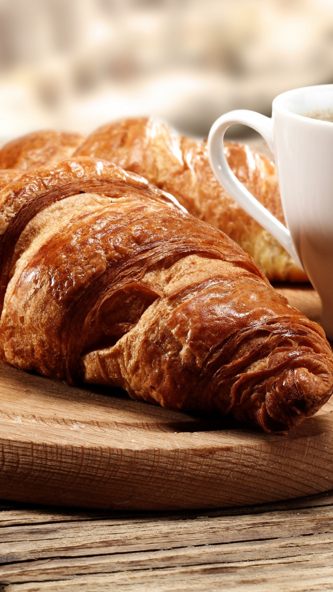 Croissant: Available in many bakeries and cafes worldwide, Coffee, Breakfast. 1080x1920 Full HD Wallpaper.
