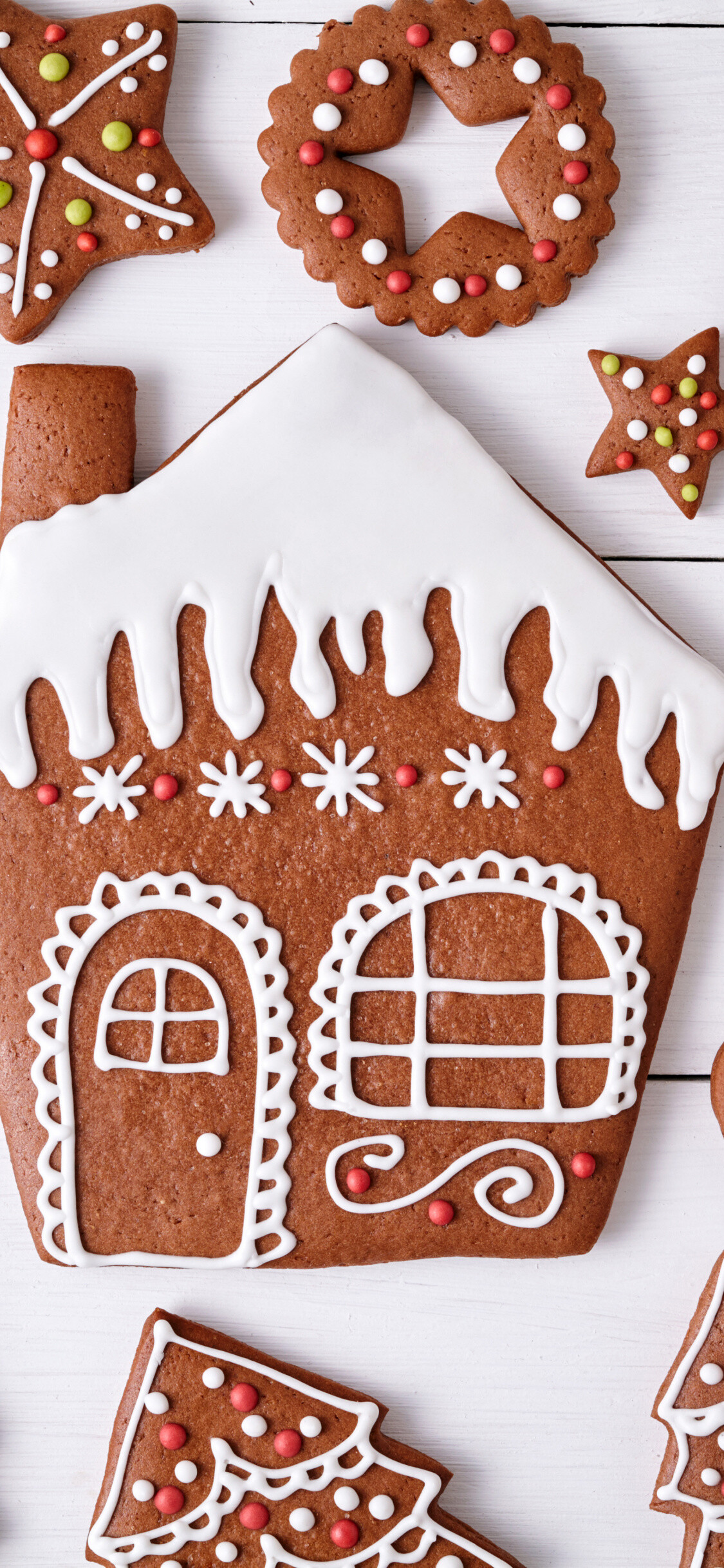 Gingerbread House: Mouthwatering gingersnap cookies, Sprinkles, Confectionery decoration. 1130x2440 HD Wallpaper.