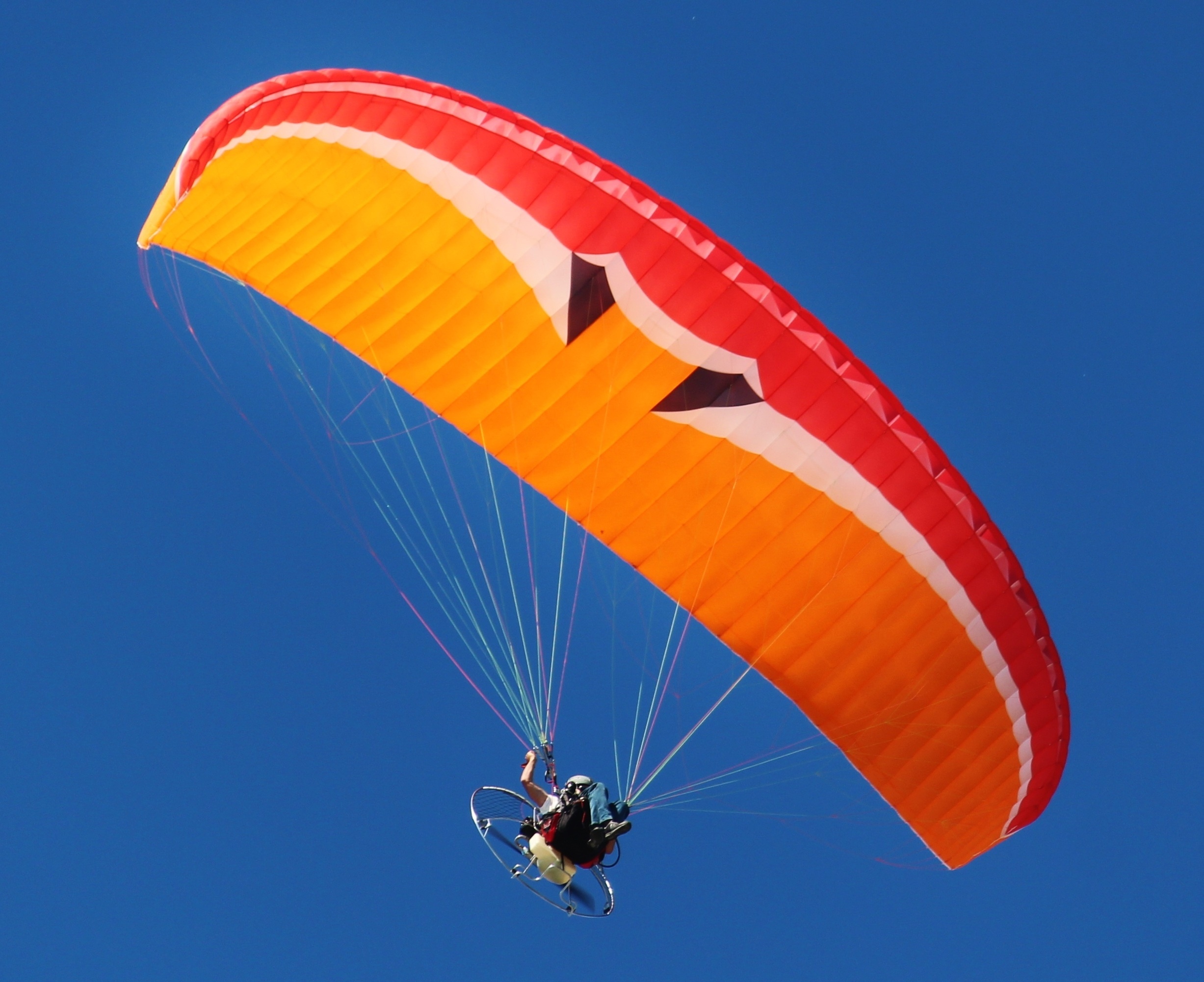 Air Sports: Paraglider gains height, Racing to an altitude of a few thousand meters, Aircraft's wings and parachute. 2460x2010 HD Background.