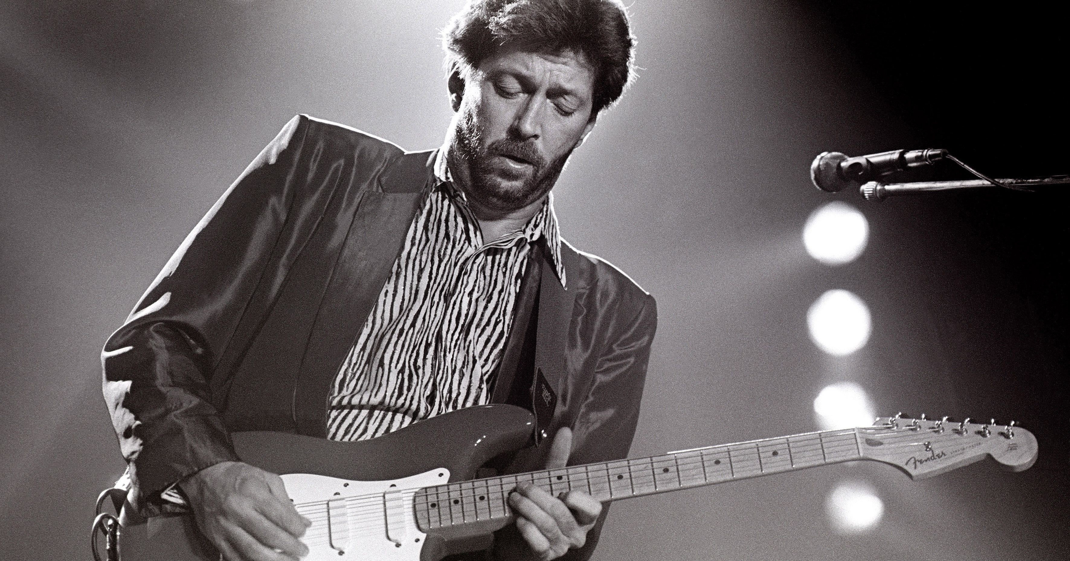 Eric Clapton, Soulful performances, Electrifying stage presence, Guitar mastery, 3550x1860 HD Desktop