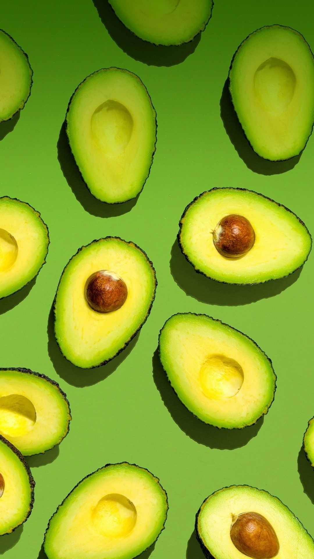 Avocado: Greenish or yellowish flesh with a buttery consistency, A rich nutty flavor. 1080x1920 Full HD Background.