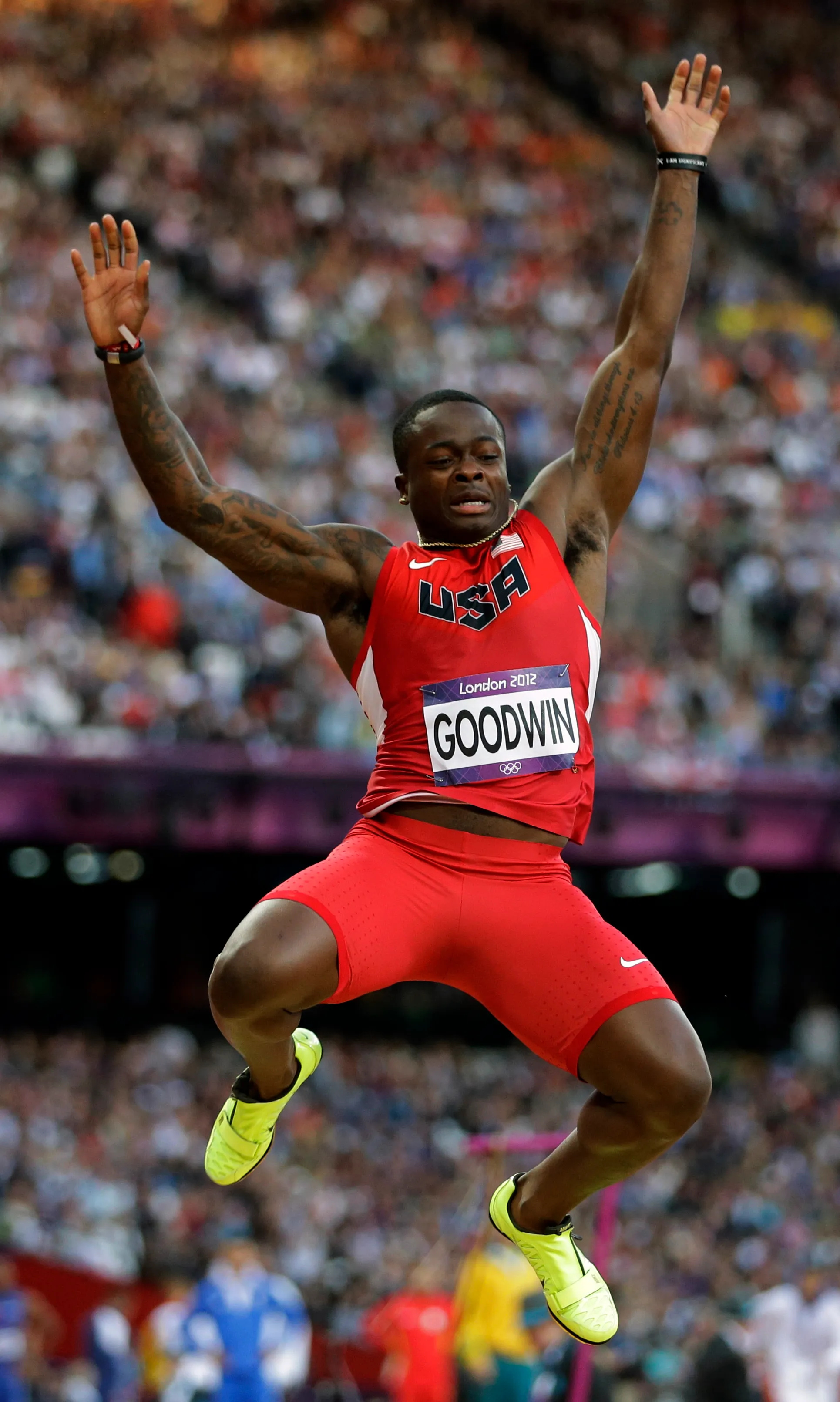 Long Jump: London 2012 Summer Olympics, Marquise Goodwin, USA National Team, Track Championships. 1930x3220 HD Background.