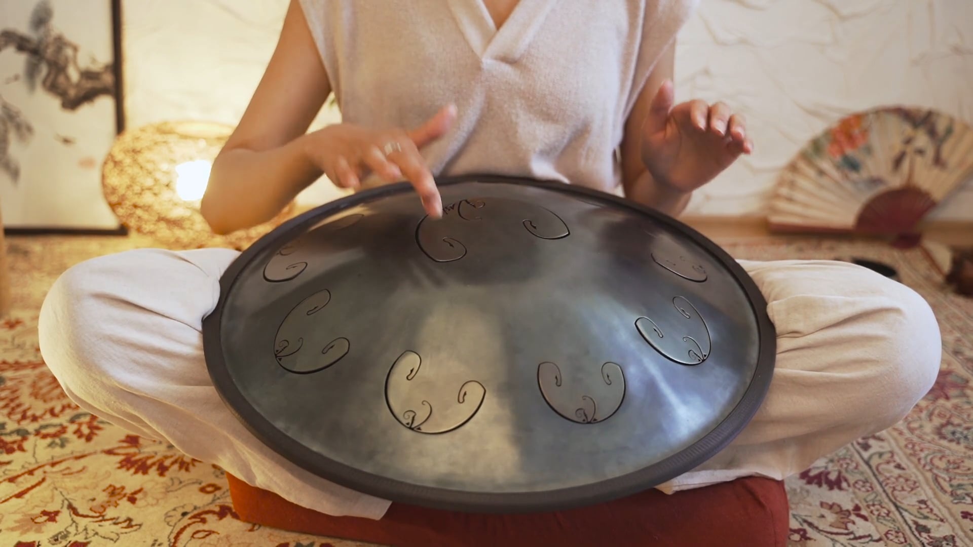 Hang (Instrument): Playing hang drum, The handpan playing activity incorporated into meditation and yoga. 1920x1080 Full HD Background.