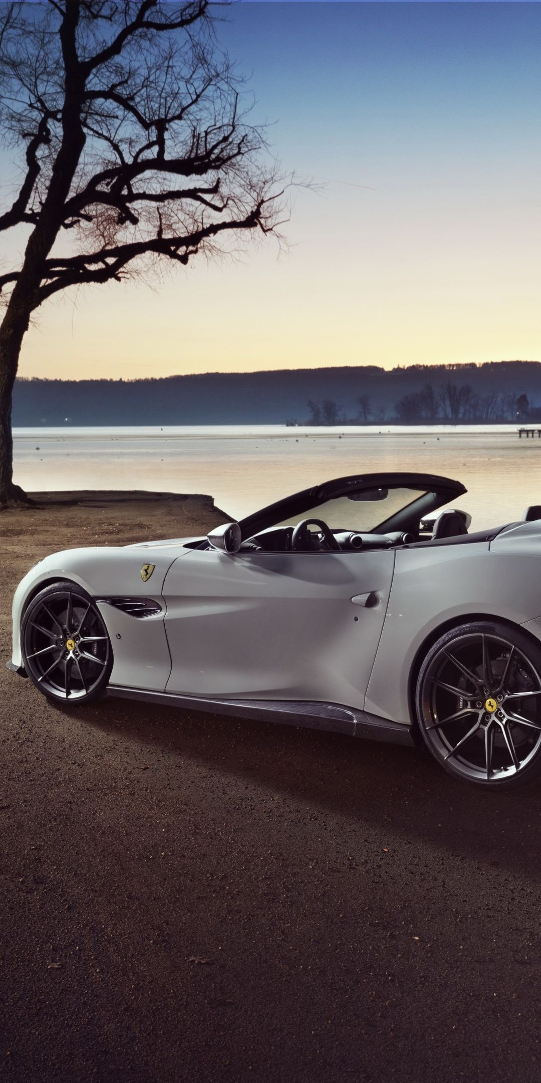 Ferrari Portofino M, White beauty, Sports car elegance, Striking side view, 1080x2160 HD Phone