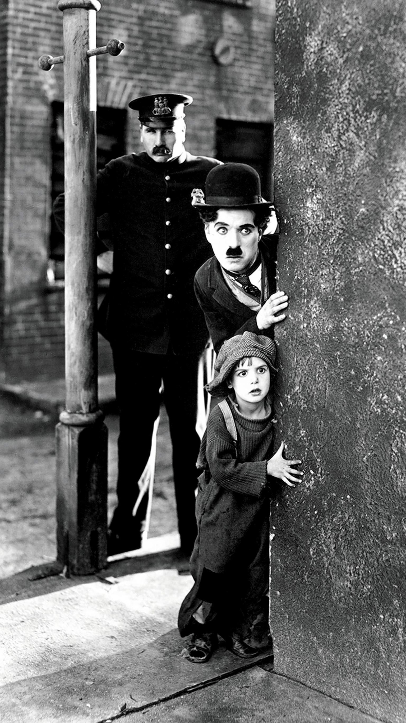 Charlie Chaplin, Comedy genius, Silent film era, Iconic character, 1540x2740 HD Phone
