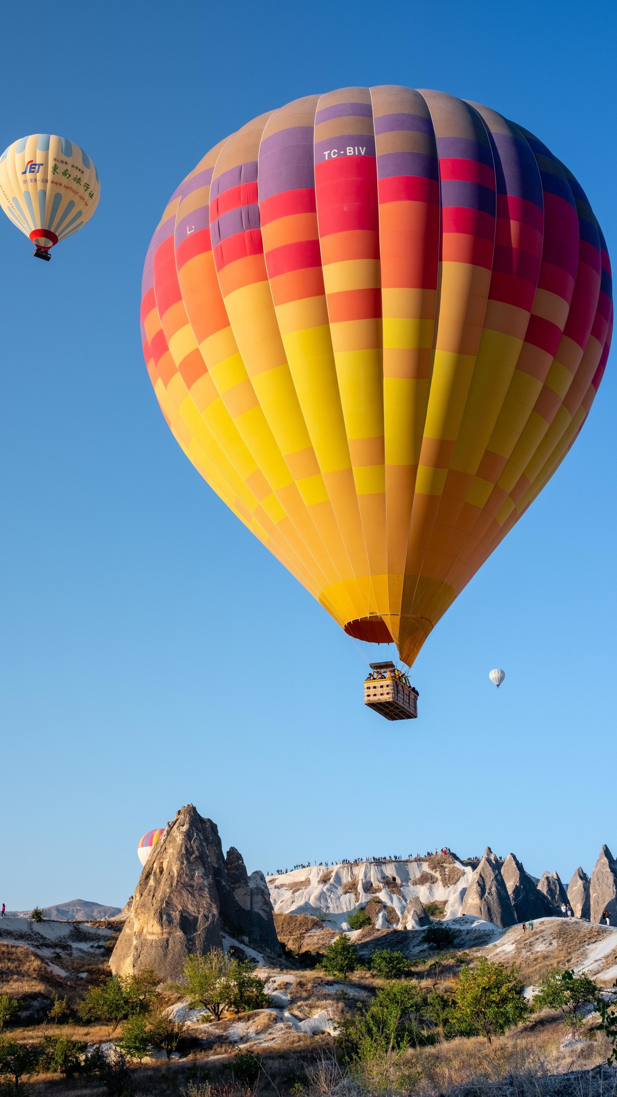 Air Sports: Hot-air balloon rides up to the sky, balloon flight over the rocks. 2160x3840 4K Wallpaper.