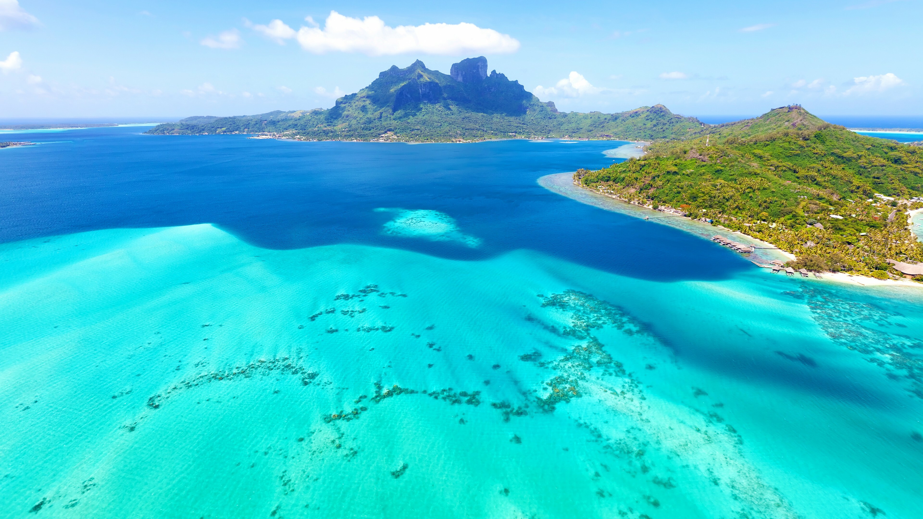Tahiti: A small South Pacific island, French Polynesia, Beach, Ocean. 3840x2160 4K Background.