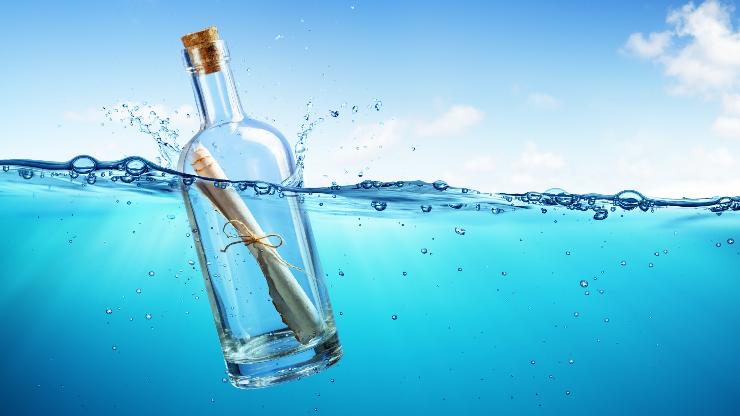 Message in a Bottle: Were used to send distress signals or to inform others of the location of shipwrecks. 2560x1440 HD Background.