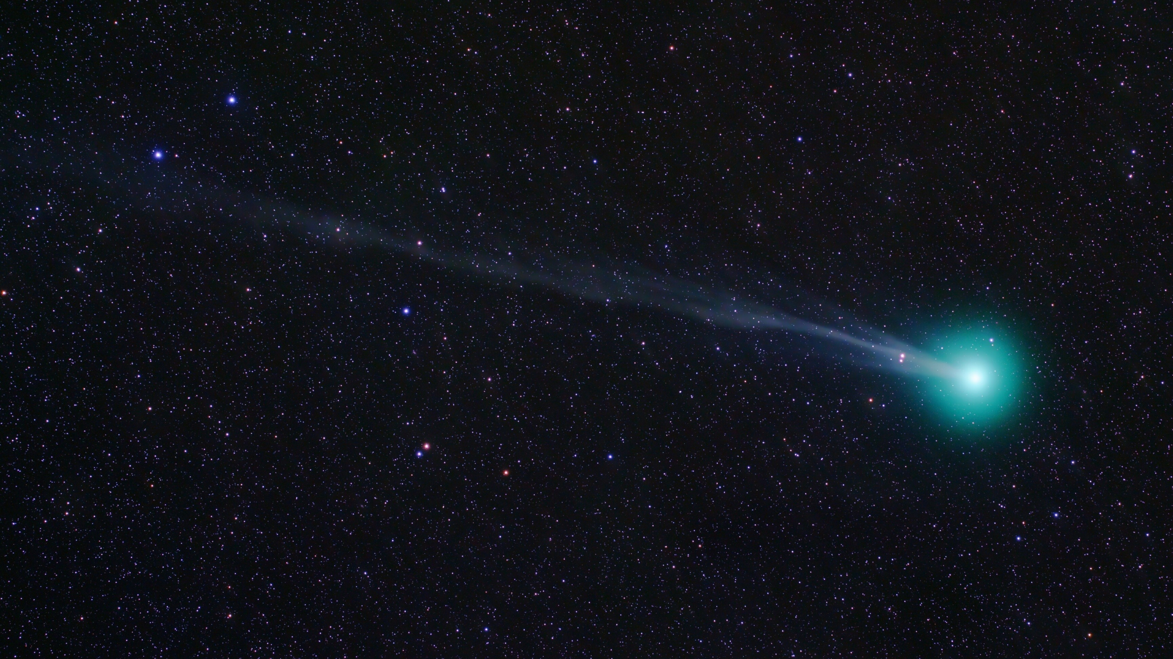 Comet: The tail may stretch beyond one astronomical unit, Universe. 3840x2160 4K Background.