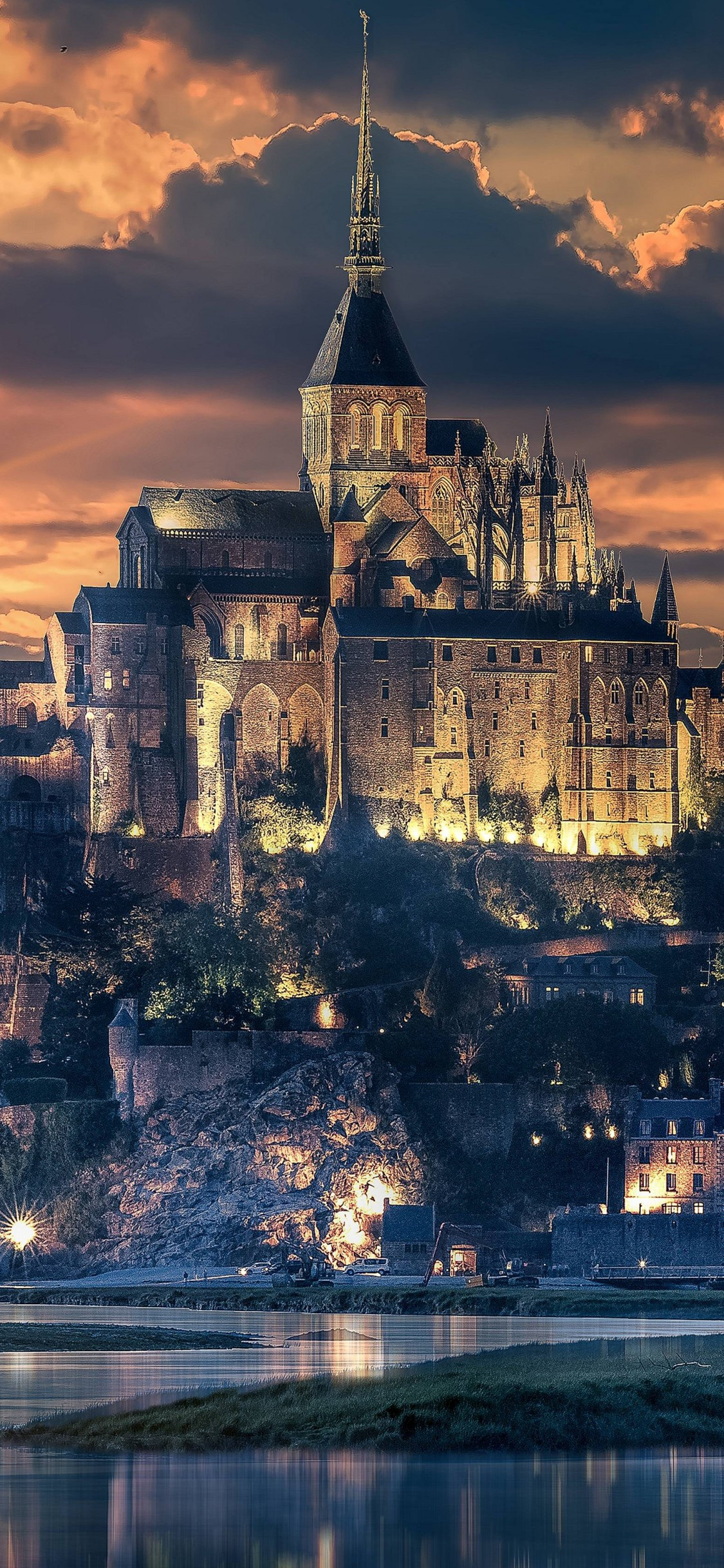 Mont Saint Michel, Sunset scenic wallpapers, Enchanting castle, Beautiful backdrop, 1130x2440 HD Phone