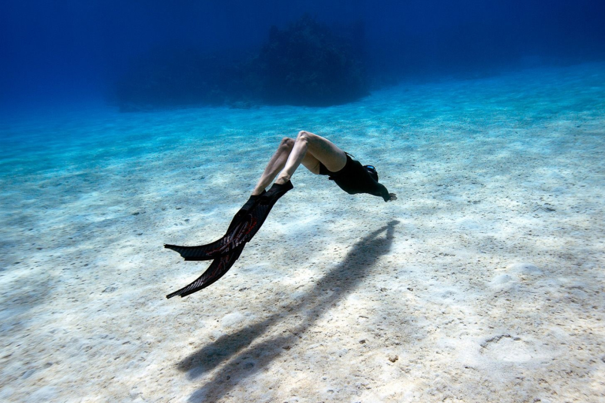 Freediving: Underwater swimming near the bottom, Breath-hold water sports discipline. 2000x1340 HD Background.