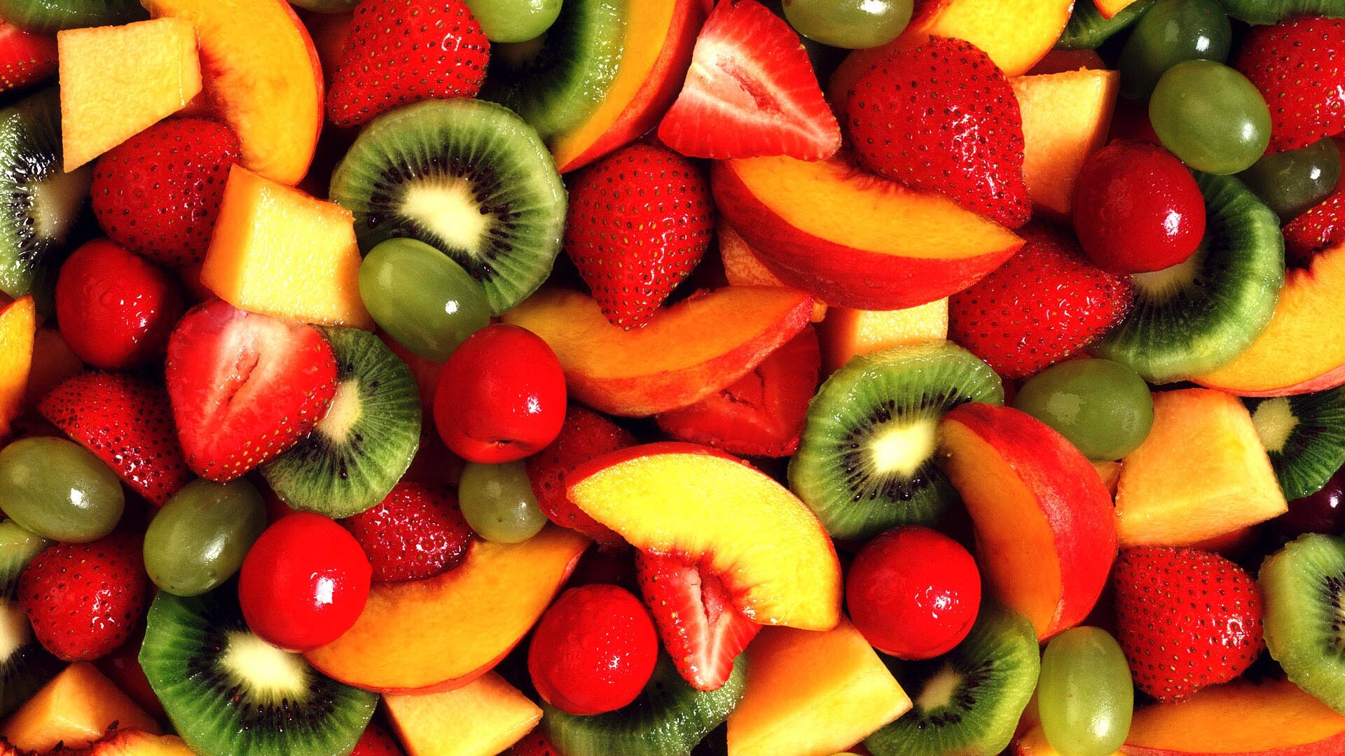 Fruit: The edible portion of the plant that develops from a flower and contains seeds, Peach, Kiwi. 1920x1080 Full HD Background.