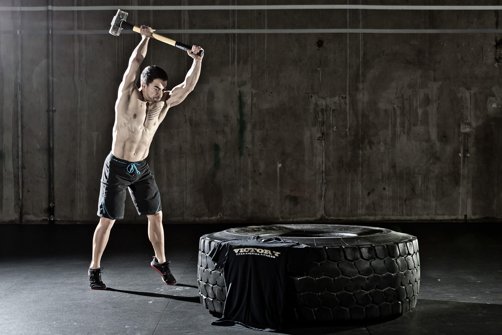 CrossFit: The sizes and types of tires, Hitting the big tire, Sledgehammer, Sports gear. 2000x1340 HD Wallpaper.