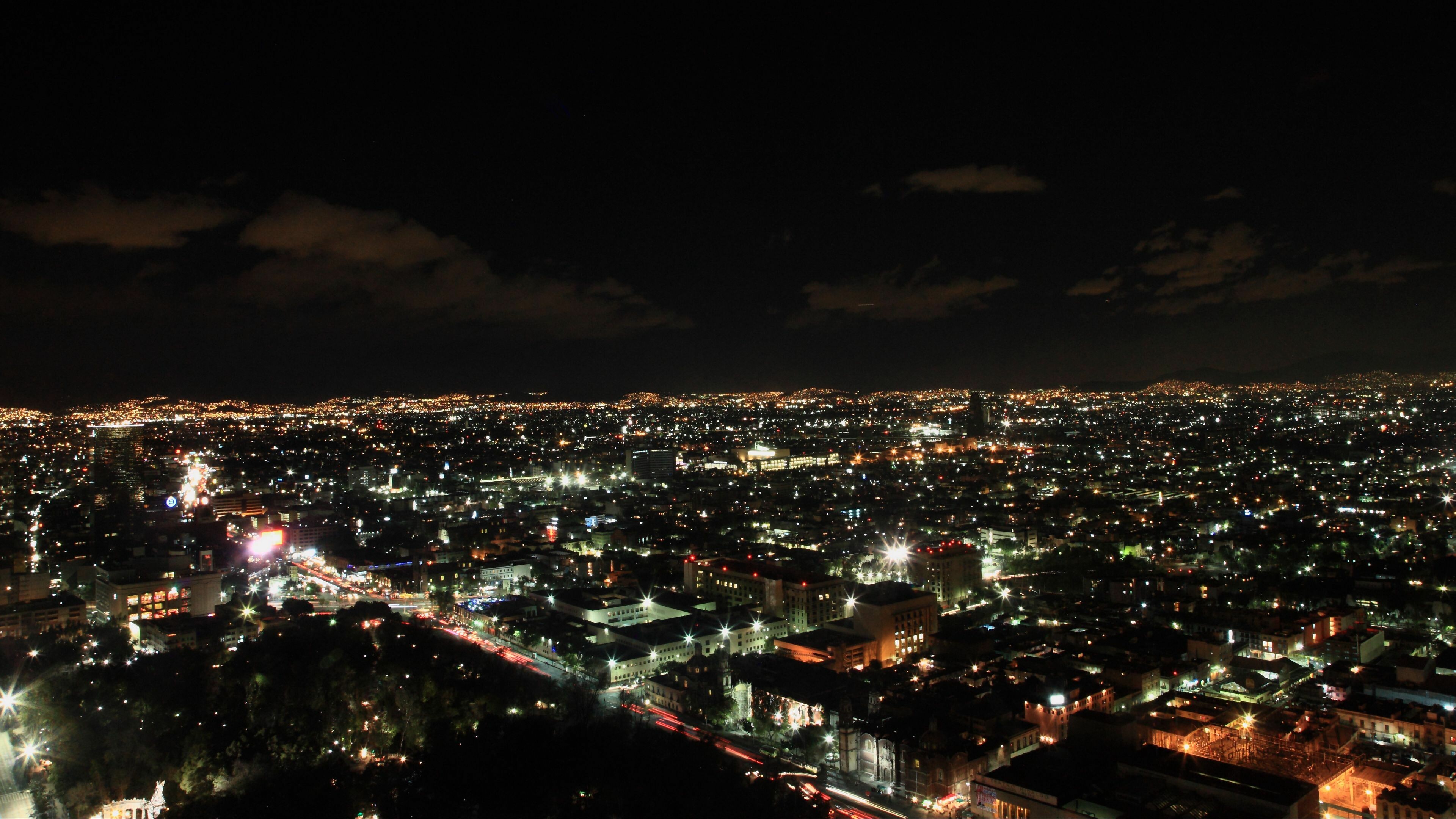 Mexico: Night city, City lights, The country covers 761,610 square miles. 3840x2160 4K Background.