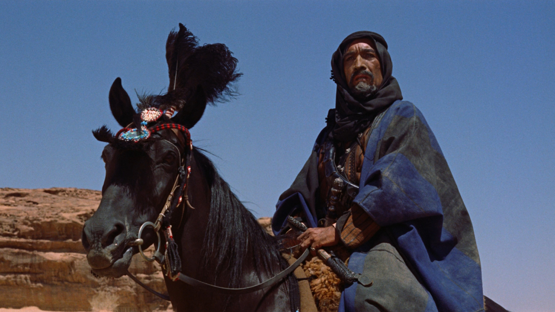 Lawrence of Arabia: Anthony Quinn as Auda abu Tayi, The leader of a Huwaytat tribe of Bedouin Arabs. 1920x1080 Full HD Background.