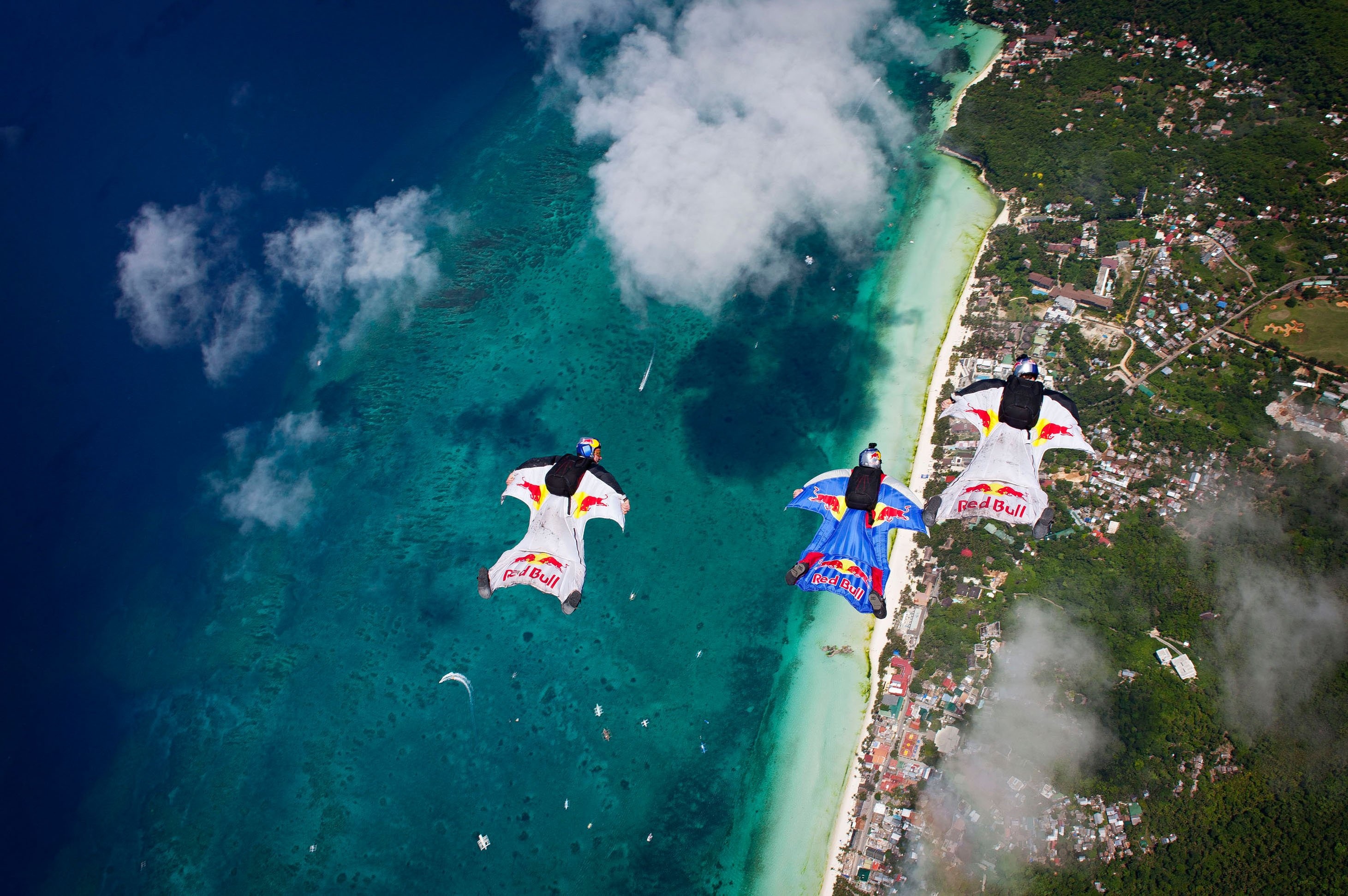 Wingsuit Flying: Extreme birdman skydiving, Red Bull wingsuit diving team. 2930x1950 HD Background.