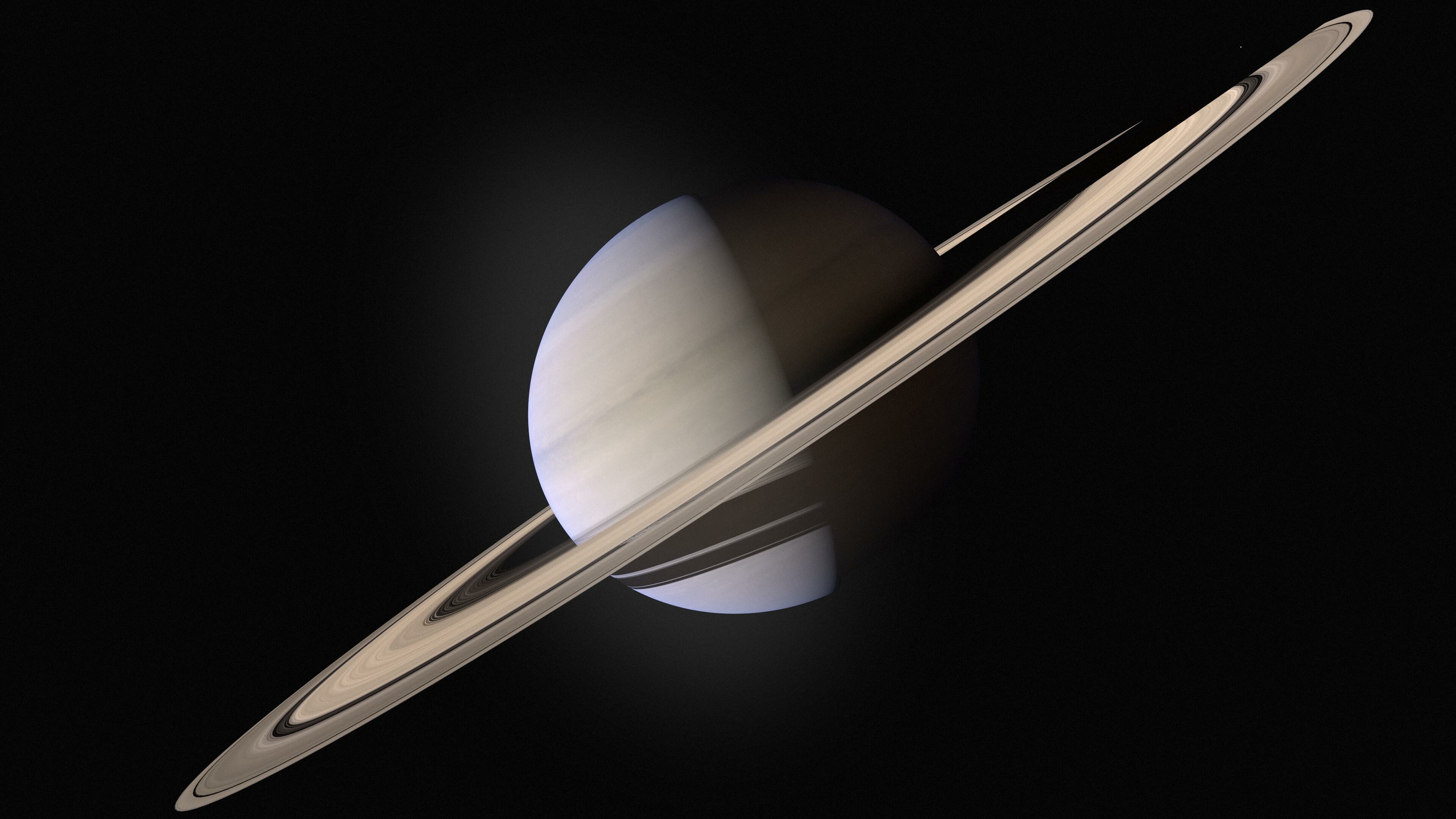 Saturn: A gas giant with an average radius of about nine and a half times that of Earth. 3840x2160 4K Wallpaper.