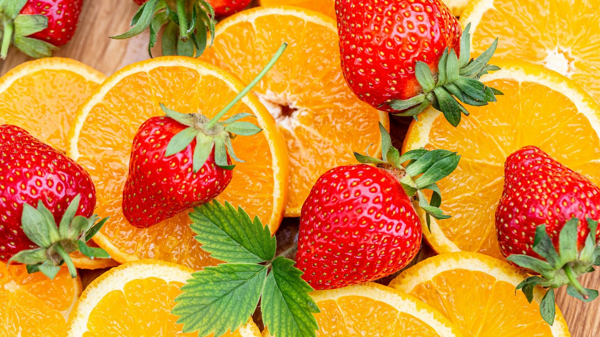 Fruit: Strawberries, Fragaria ananassa, Originated in Europe in the 18th century. 1920x1080 Full HD Wallpaper.
