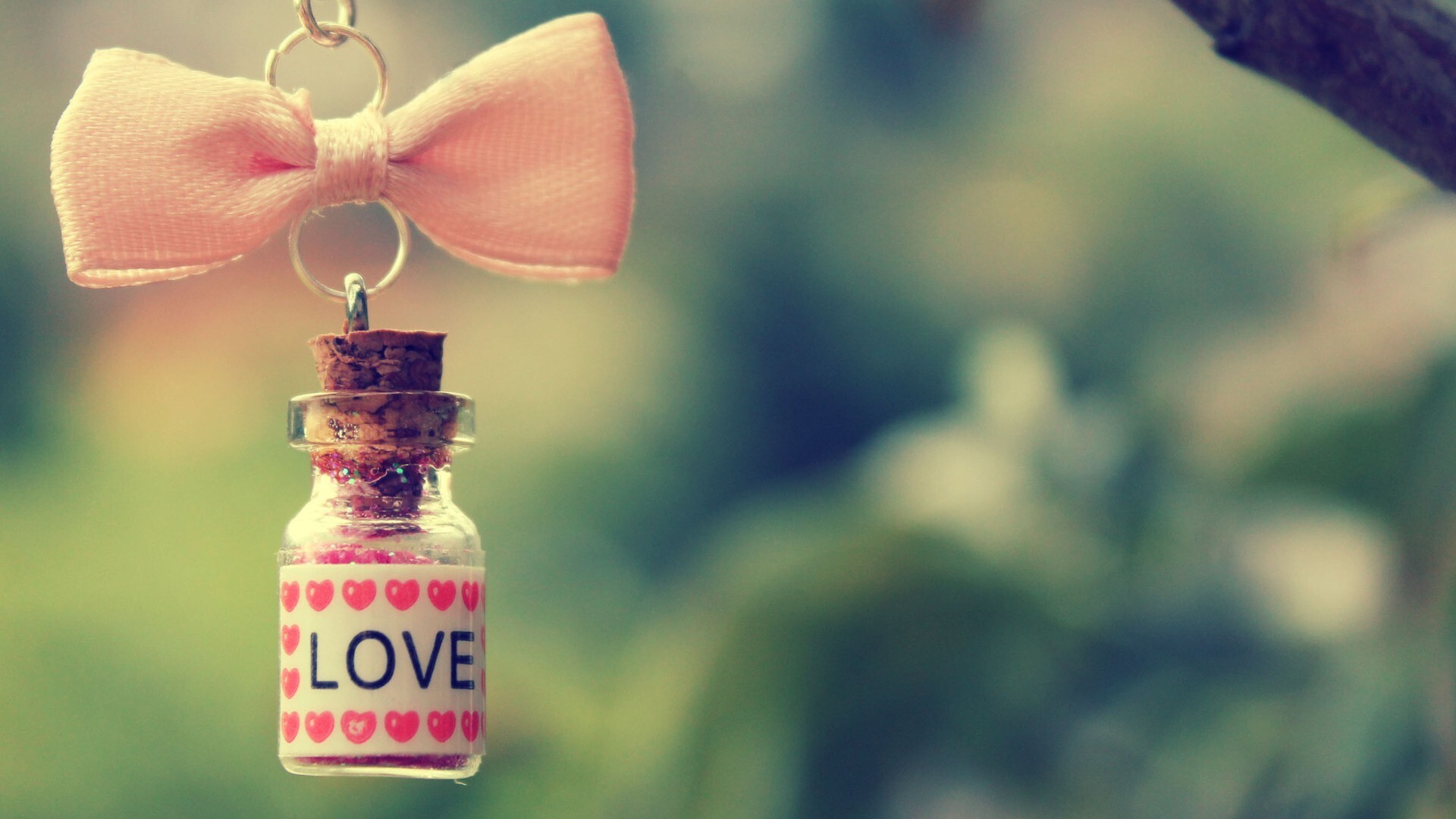 Girly: Cute custom hand-made keychain, A small glass bottle with bow tie. 1920x1080 Full HD Background.