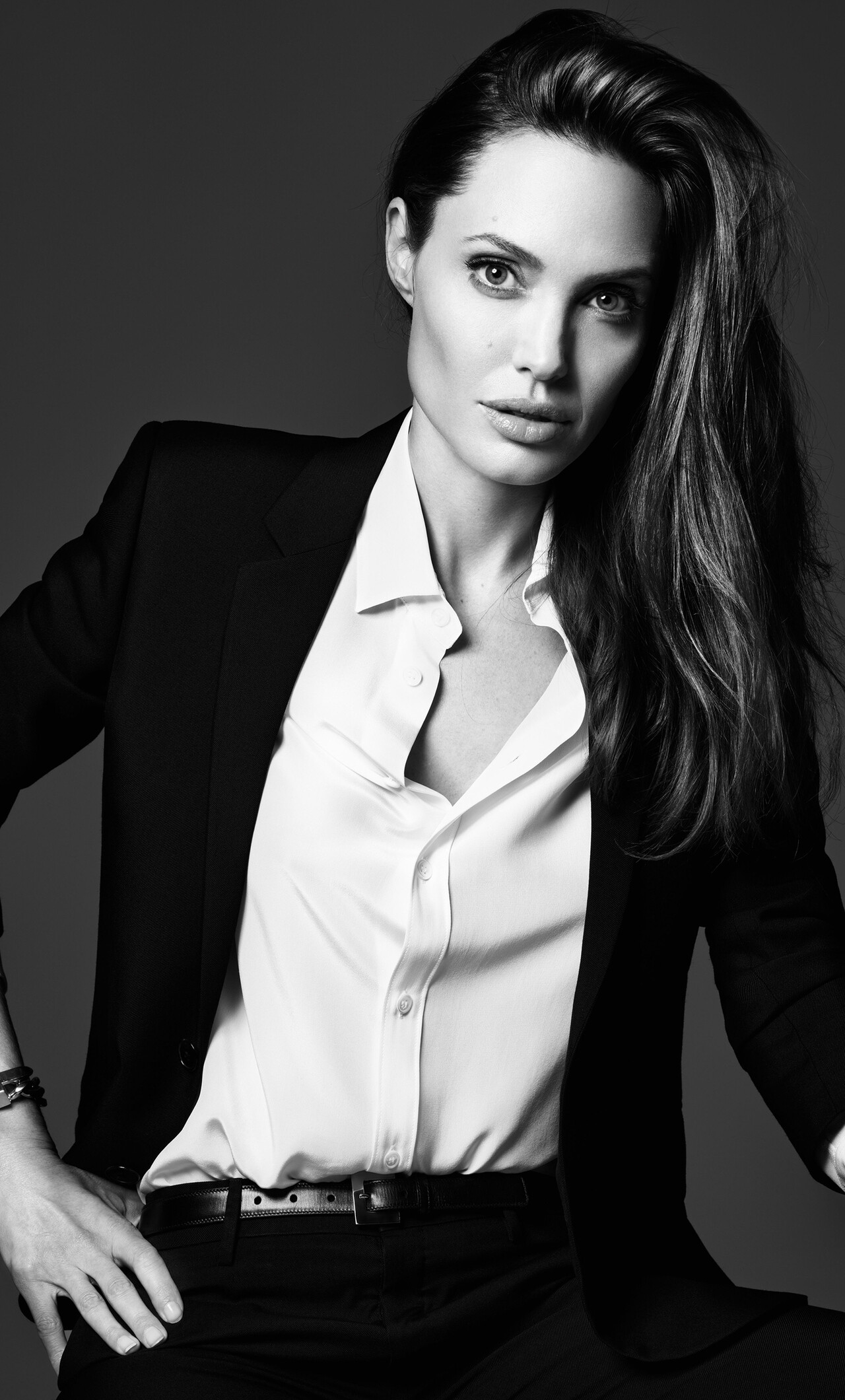 Angelina Jolie: American actress and director, Known for her humanitarian work. 1280x2120 HD Wallpaper.
