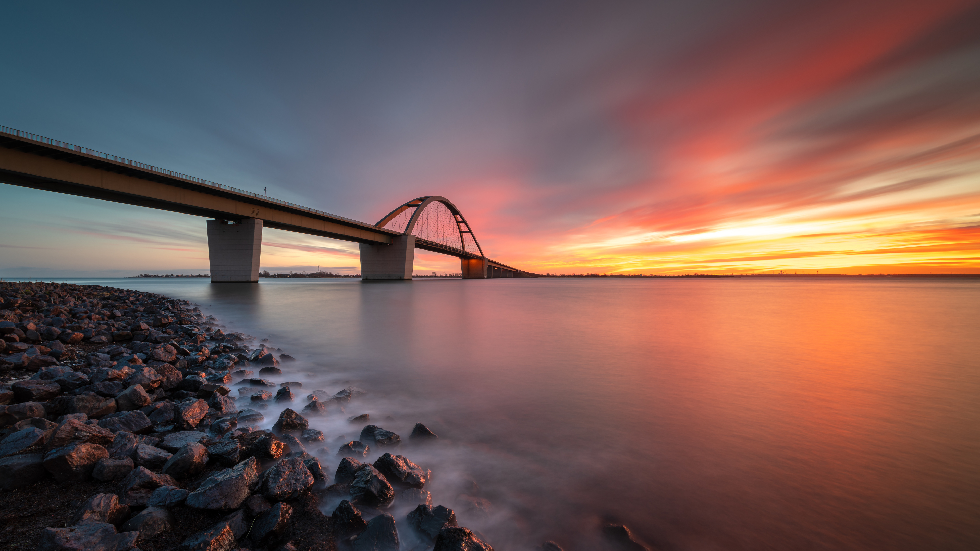 Bridge: Amazing sunset and the structure built to span the strait. 3840x2160 4K Wallpaper.
