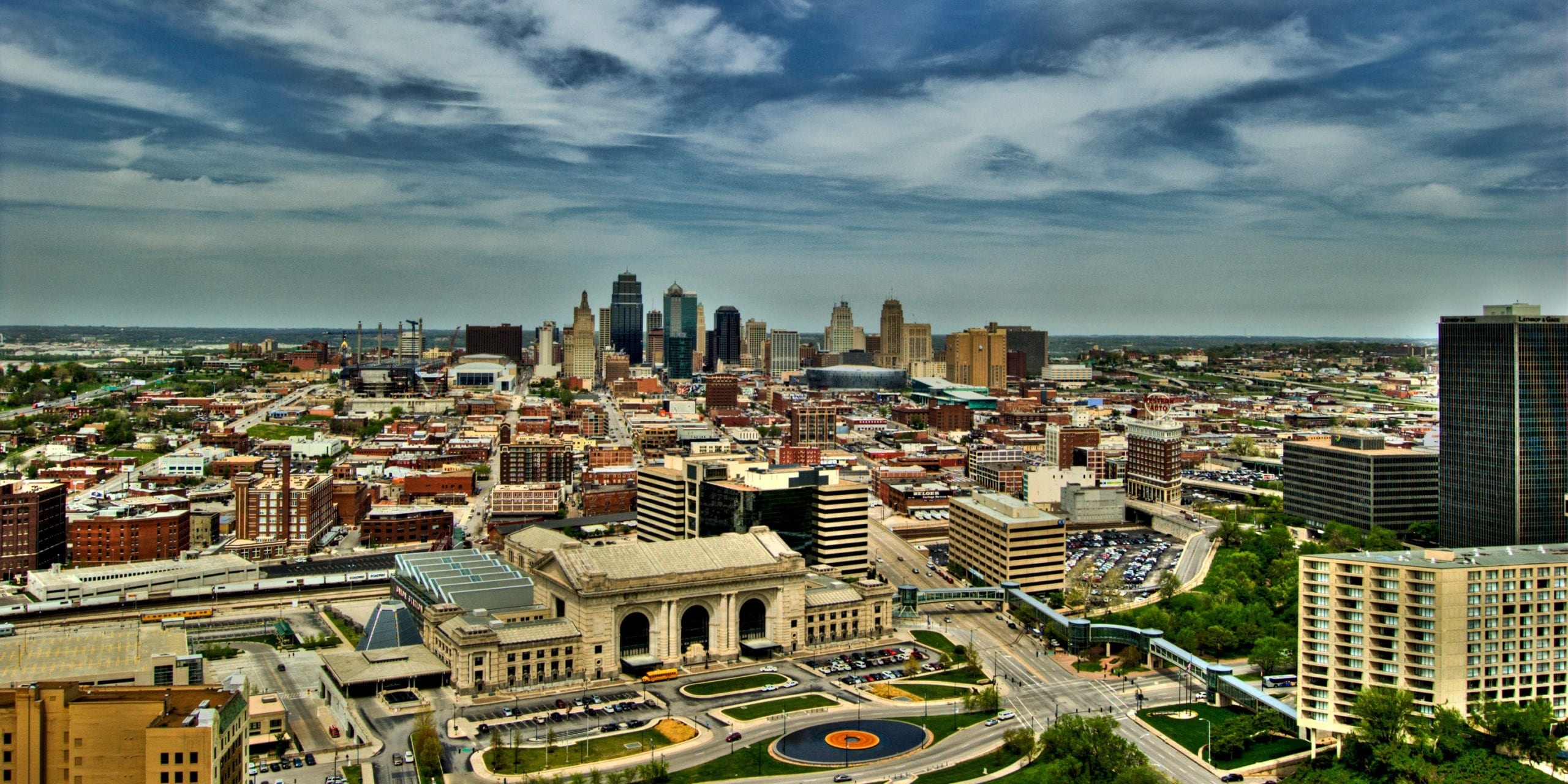 Kansas City: Officially nicknamed the “City of Fountains”, Urban landscape. 2560x1280 Dual Screen Background.
