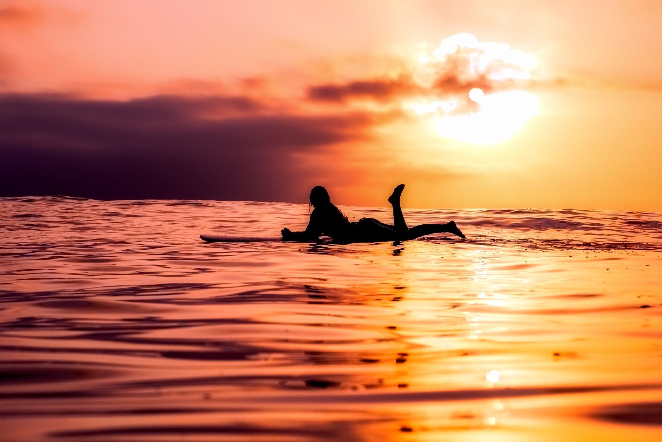 Girl Surfing: Recreational water sports at sunset, Ocean shores water. 2560x1710 HD Wallpaper.