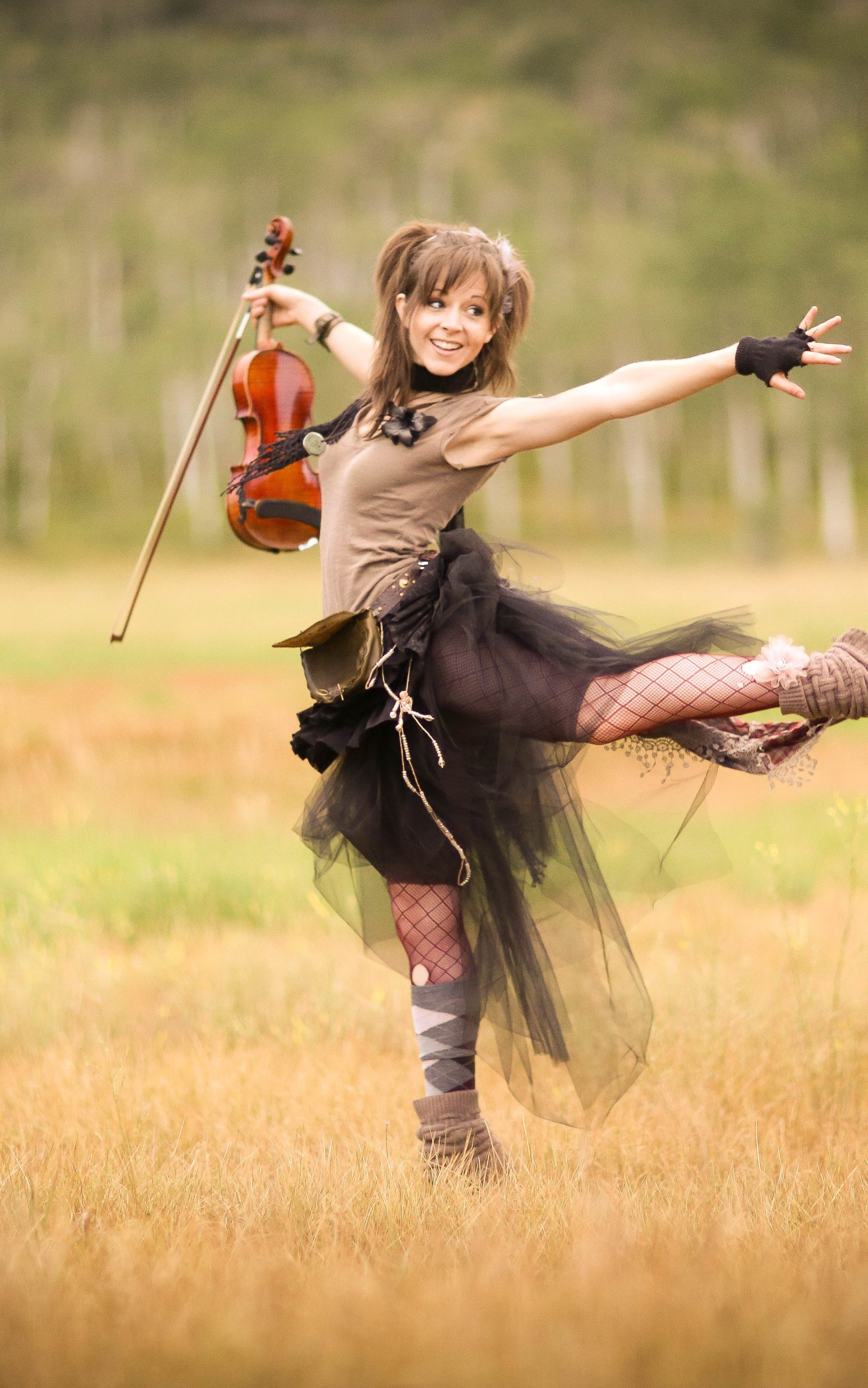 Lindsey Stirling, Talented musician, Energetic performances, Unique style, 1760x2800 HD Phone