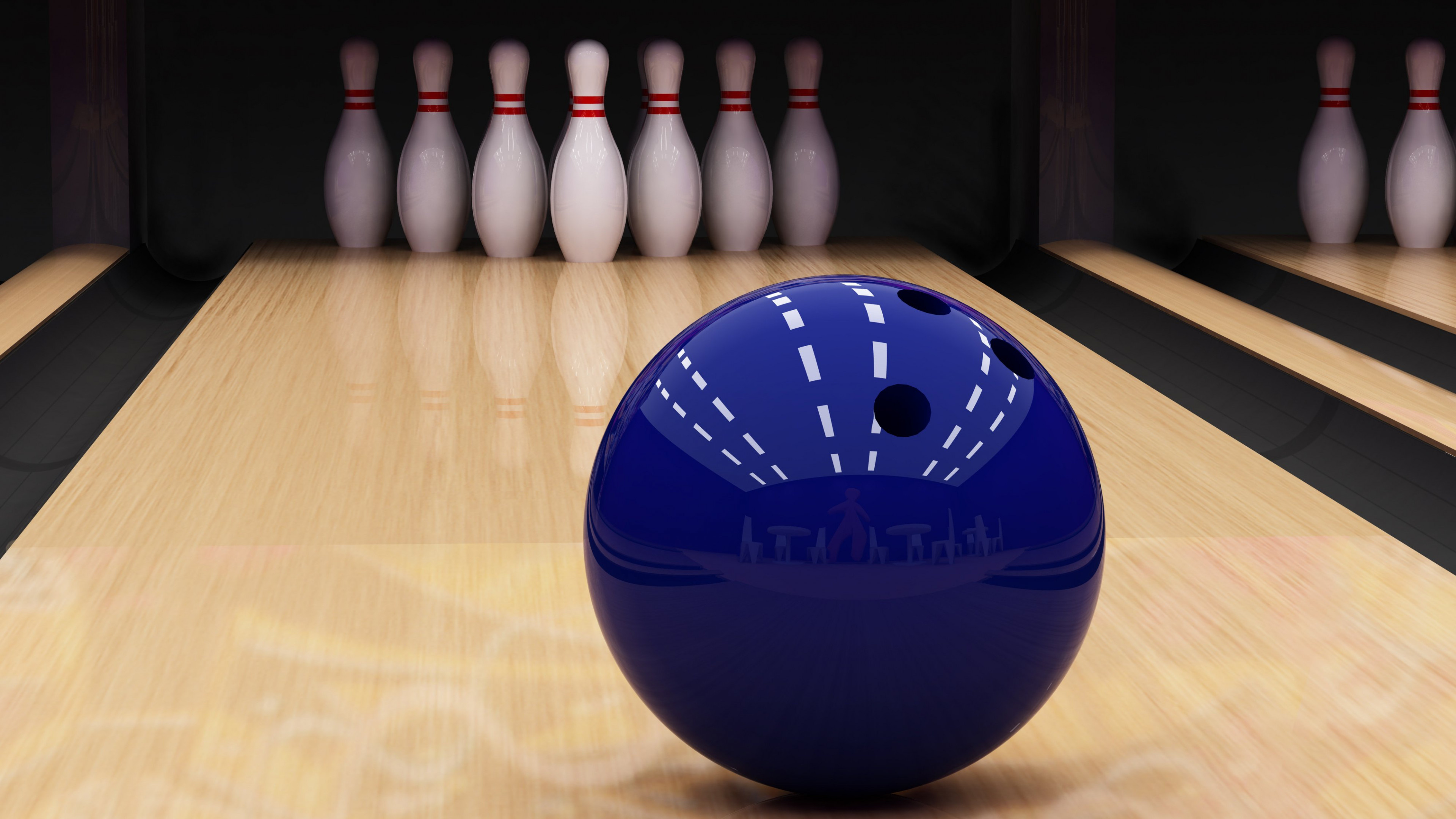 Bowling: A game which goal is to knock over pins on a long playing surface. 3840x2160 4K Background.