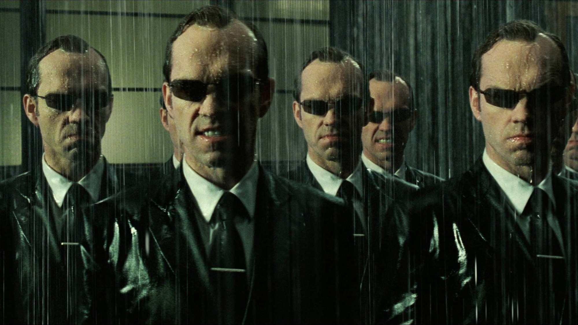 Agent Smith (The Matrix), Menacing antagonist, Dignified suit, Calculated movements, 2000x1130 HD Desktop