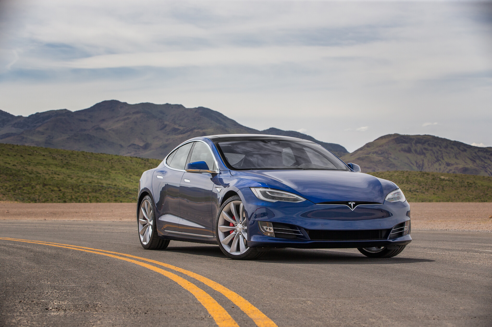 Tesla Model S: Electric luxury sedan with a high-tech minimalist cabin. 2050x1360 HD Wallpaper.