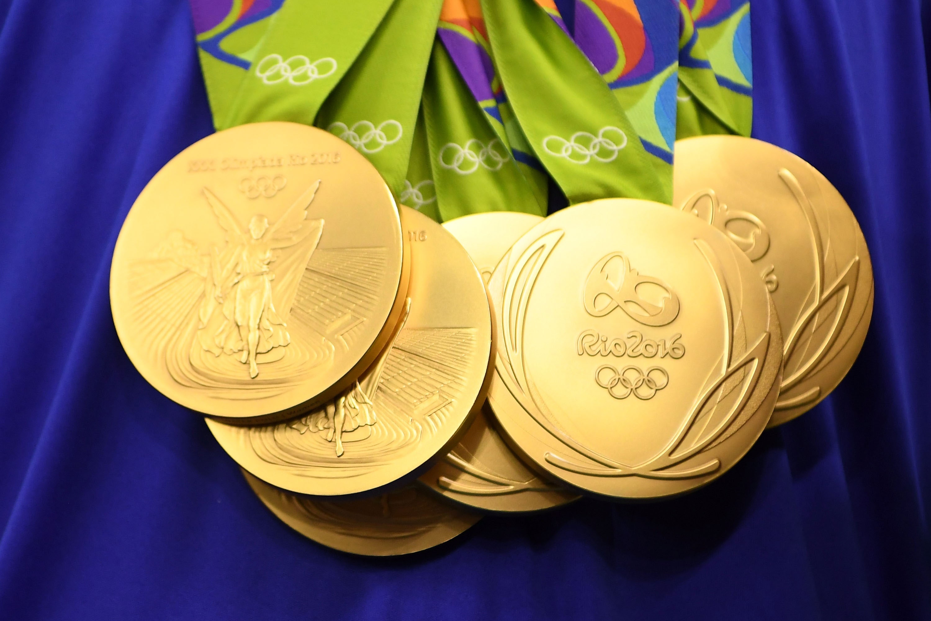 The most medals. Золотая Олимпийская медаль. Золотая медаль Олимпийских игр 2018. Олимпийское золото. Золото олимпиады.