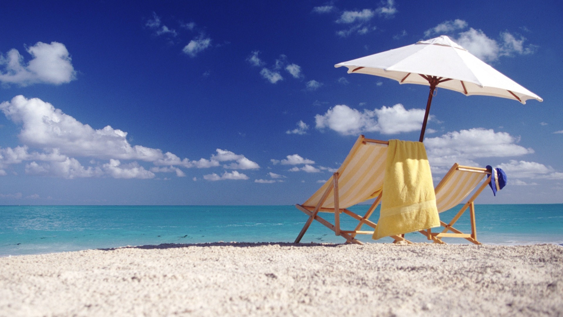 Beach Umbrella: A folding canopy supported by wooden or metal ribs. 1920x1080 Full HD Wallpaper.