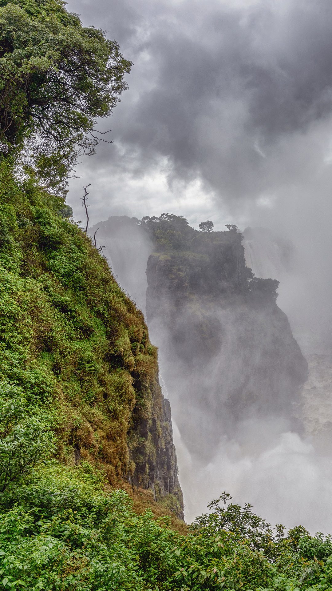 Victoria Falls Zimbabwe, Windows 10 spotlight images, Cloud forest, Enchanting scenery, 1080x1920 Full HD Phone